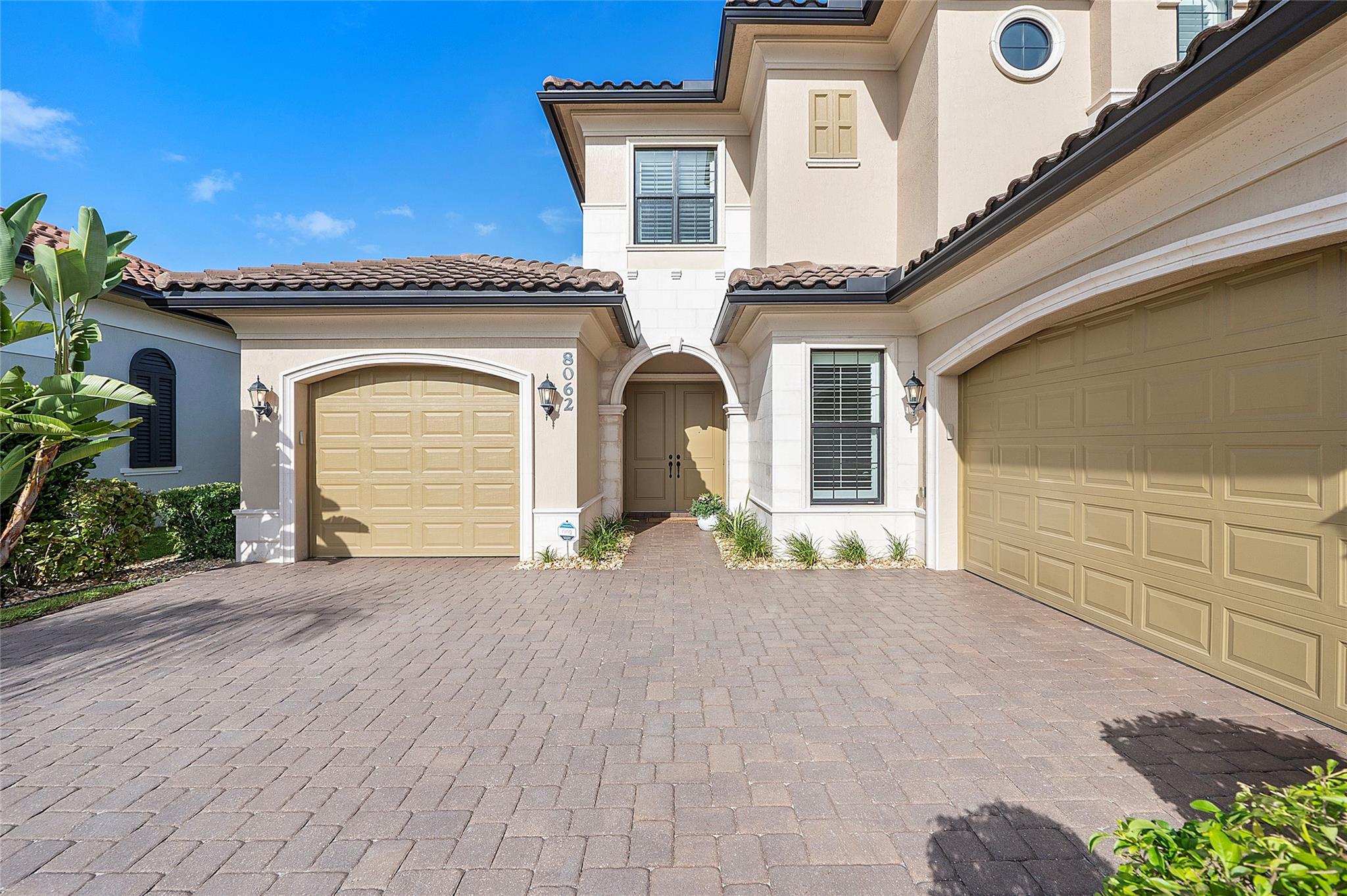 Side entry garage makes a private view of the inside
