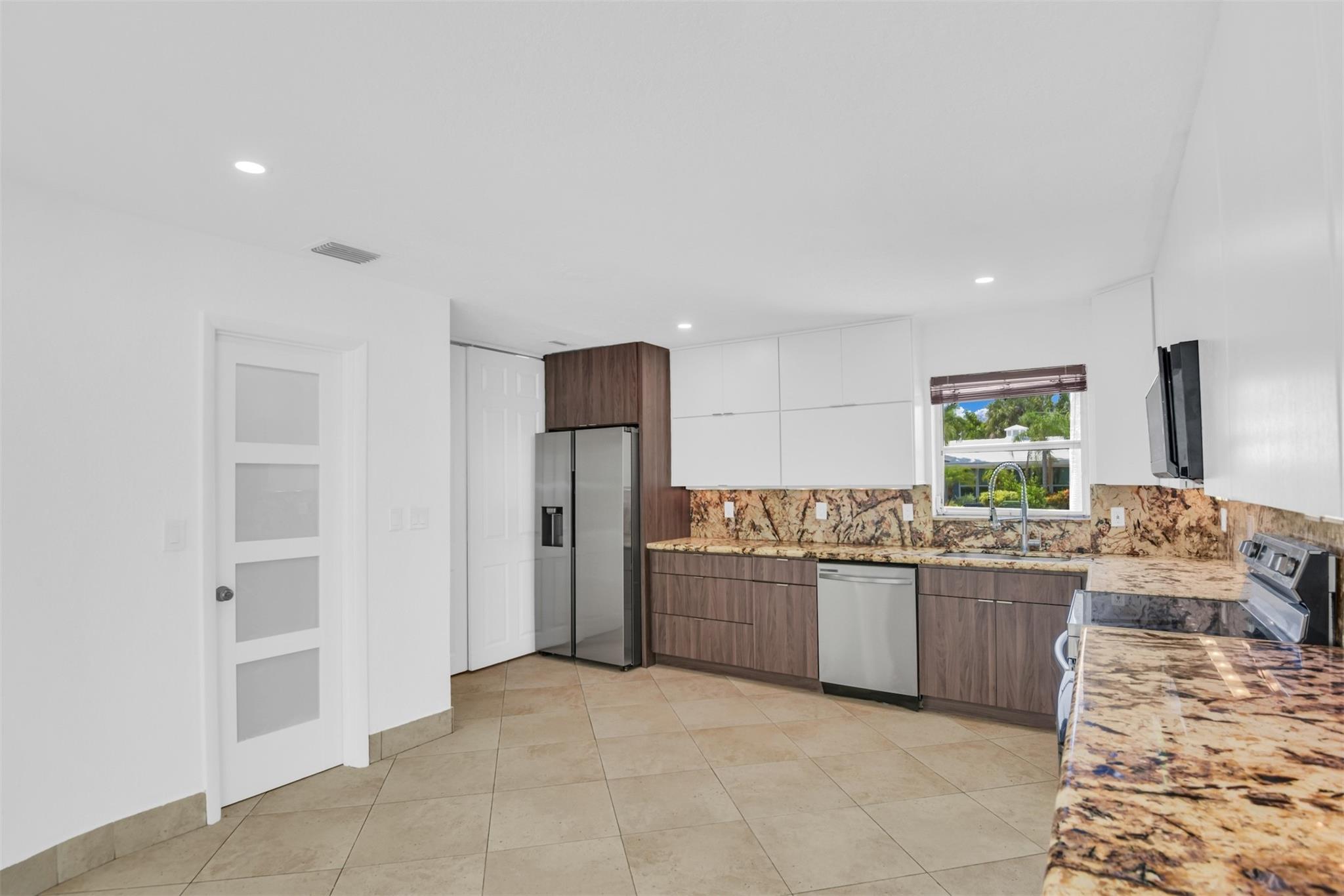 Kitchen has large walk in pantry