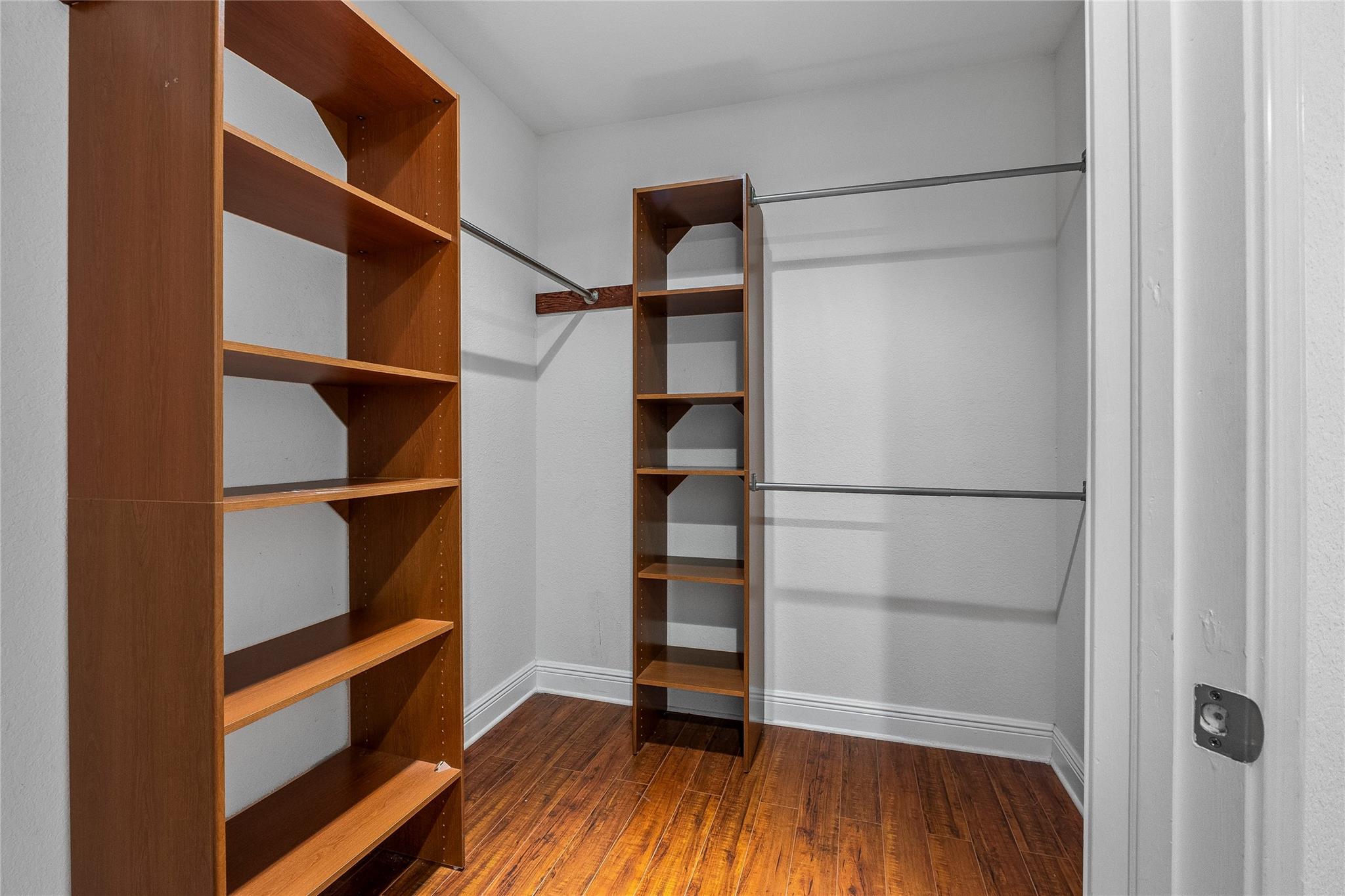 Primary suite walk-in closet.