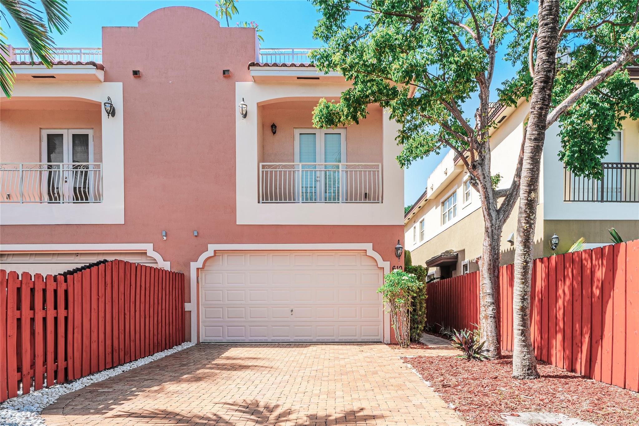 Chicago brick driveway and a 2 car garage.