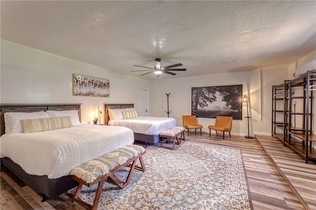 Master bedroom w/ two queen