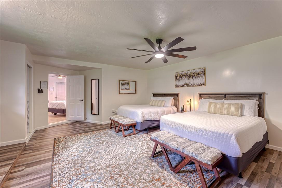 Master bedroom w/ two queen