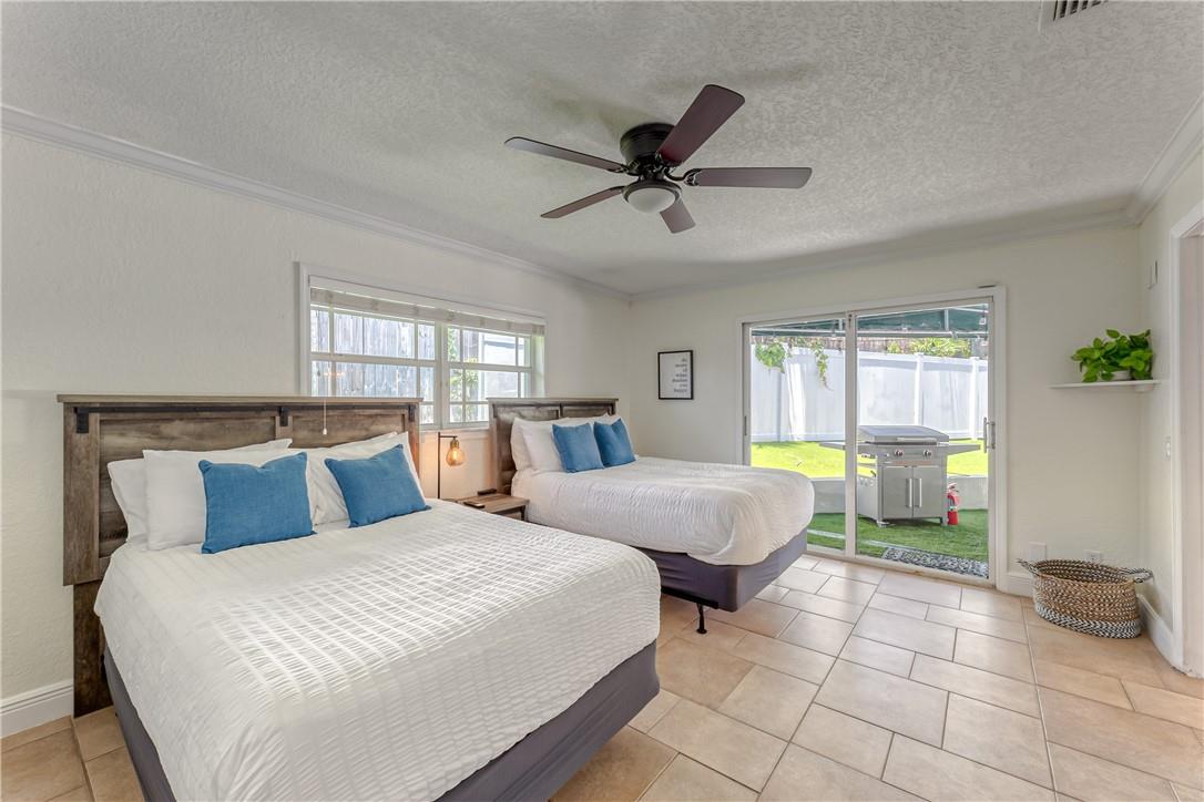 Master bedroom w/ two queen