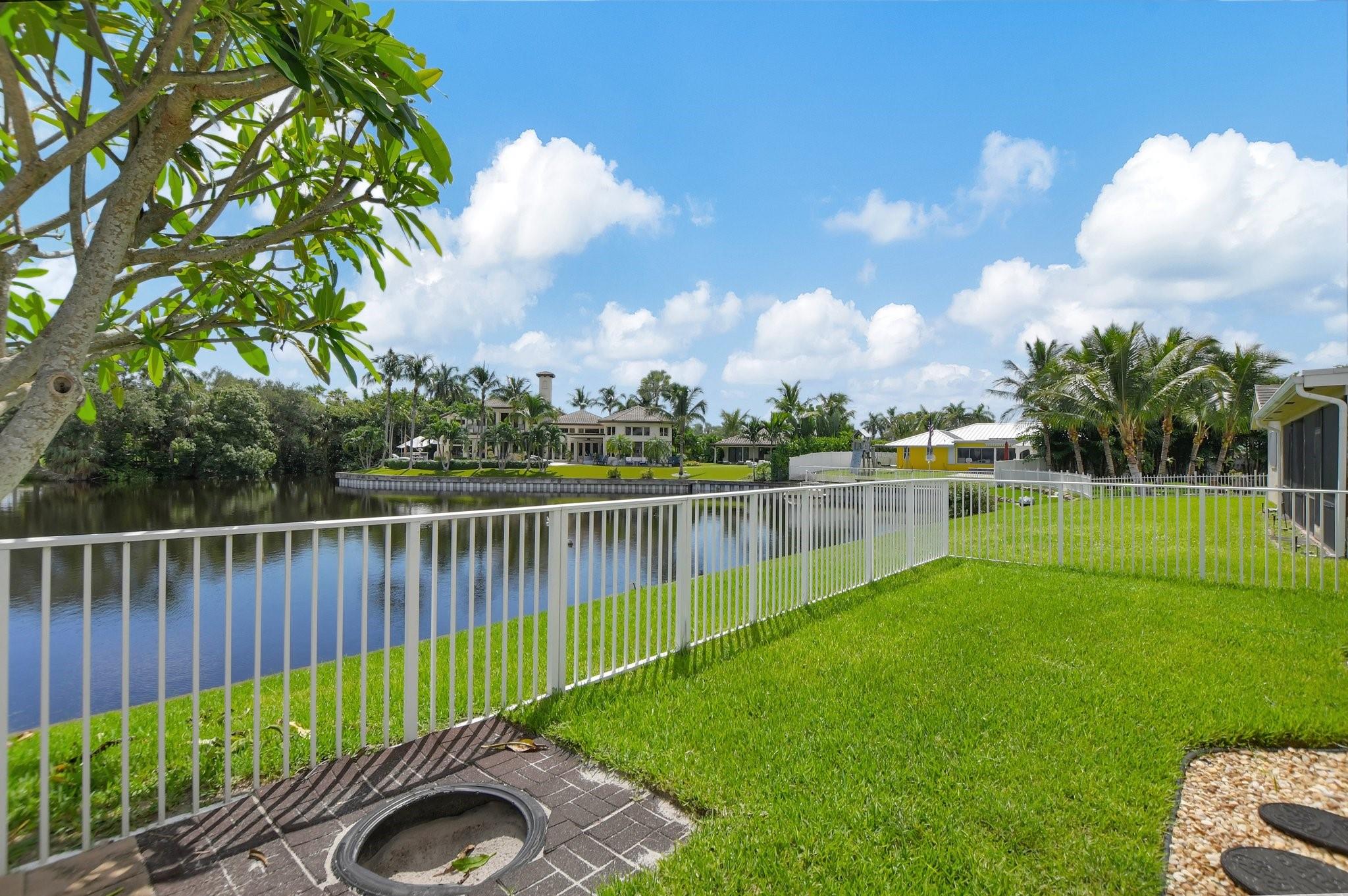 Fenced-in back yard with an amazing view! Kids and Pet friendly yard. Underground tire with sand for the dogs to dig.