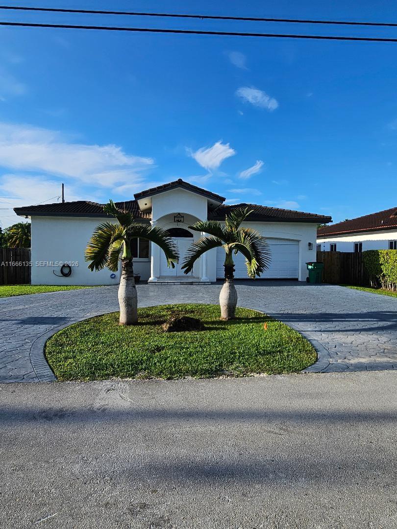 Newly built home in desirable Palmetto Bay. This 4 bedroom, 3.5 bathroom home offers modern amenities. It is designed with family living in mind. Featuring soaring 10-feet ceilings and elegant 8-feet doors. The kitchen boasts a large granite countertop, wood cabinets and stainless steel appliances all flowing seamlessly into a generous family room. Master bathroom complete with dual sinks and ample separate walk in shower. Large fenced in lot great for family entertaining with a cover back patio/porch. 2 car garage. Million Dollar Homes Around. A short distance from top schools and shopping centers. Ready for a family to move in .Driving Directions: