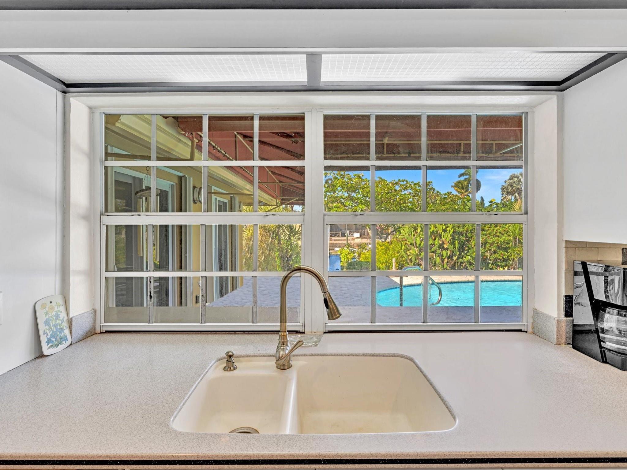 Kitchen with Pool & Canal View