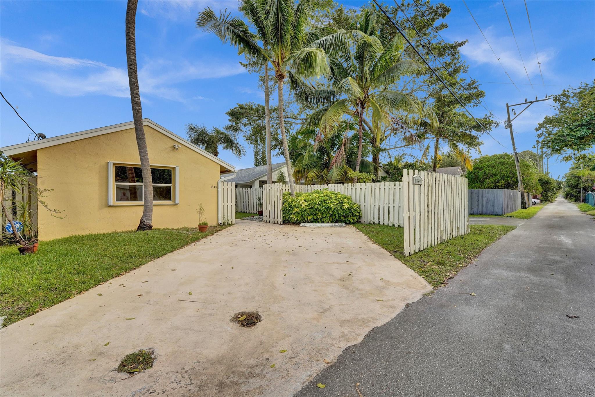 View of Cottage for the Alley with Parking