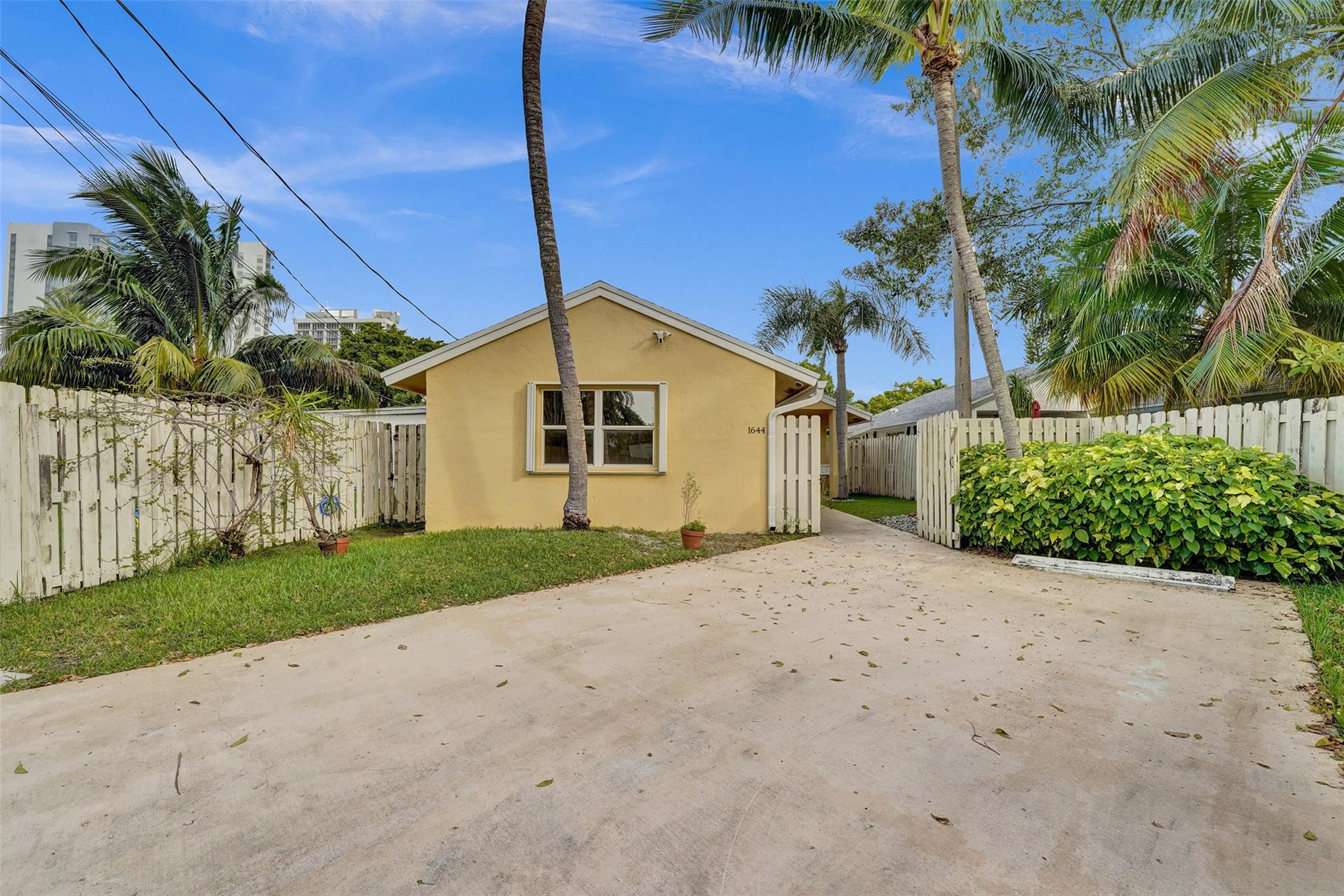 View of Cottage for the Alley with Parking