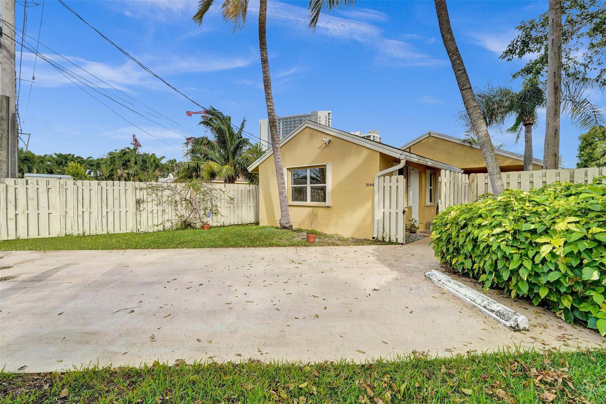 View of Cottage for the Alley with Parking