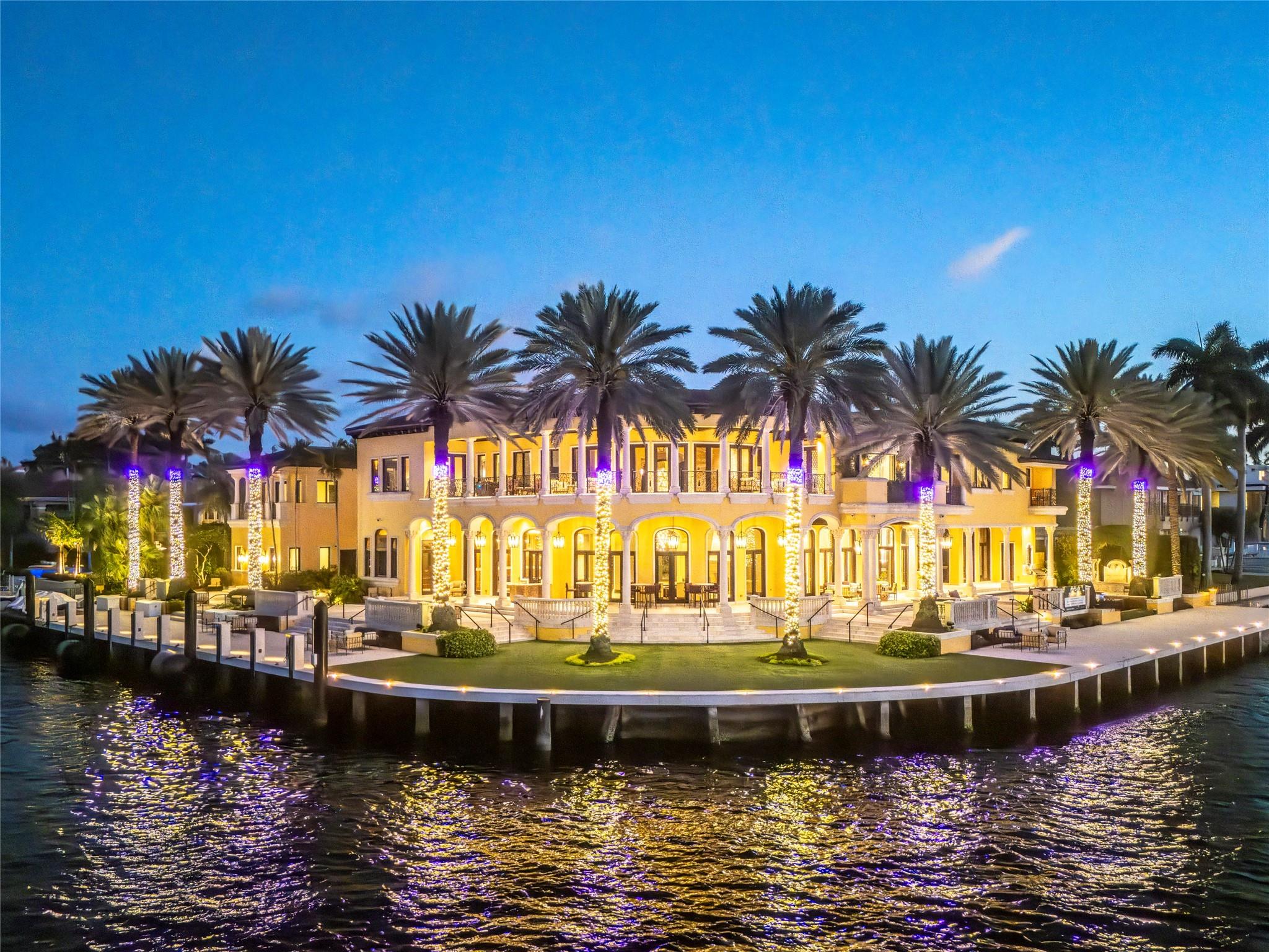 Exceptional Waterfront Point Lot! Main house extensively renovated/completed Sept 2025, which resulted in a remarkable transformation, creating a new & improved property in every way.2 story guest house gutted & renovated w/ all new Hurricane doors & windows in 2025. Most prestigious waterfront & gated community in the County. This exclusive estate offers 343' of waterfront w/170' of private protected dockage. Deep water & close to port. Perfect for yachting enthusiasts. 14,000+ SF under A/C. 6 bedrooms, 8  bathrooms & 5 half baths designed with utmost attention to detail. Glass elevator & full-house generator.4 car garage capable to convert to 8 car. Dockage amenities & details are quite impressive. Harbor Beach Residents enjoy 24/7 surveillance & 300' private ocean with a private marina.