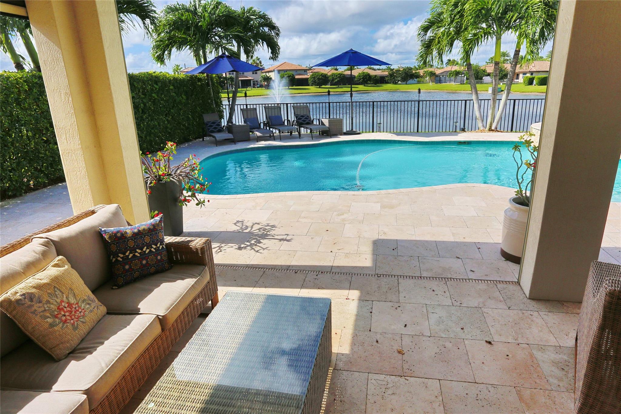 covered patio with motorized screens