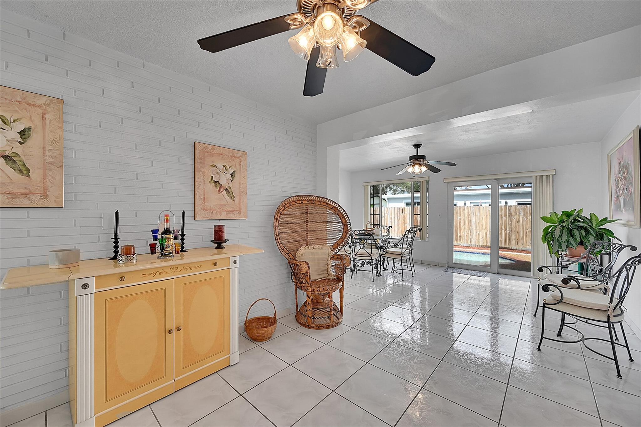 Flex space. Kitchen located behind this wall.