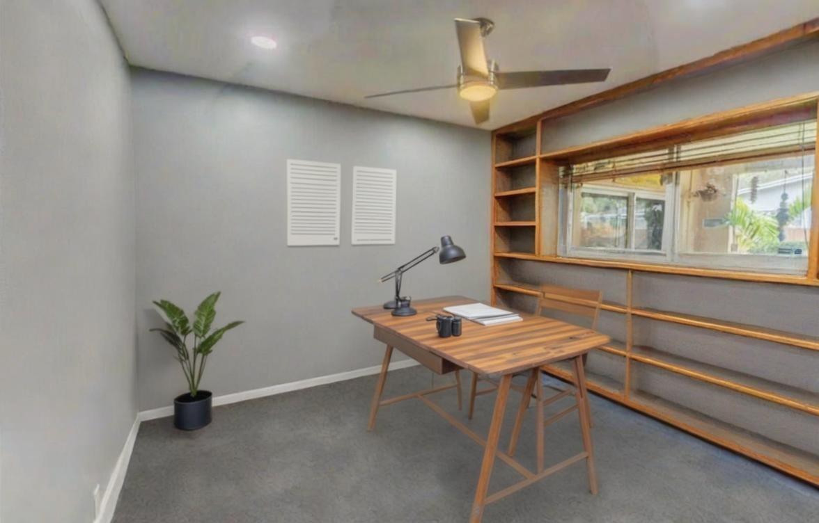 3rd bedroom with closet, currently used as office.