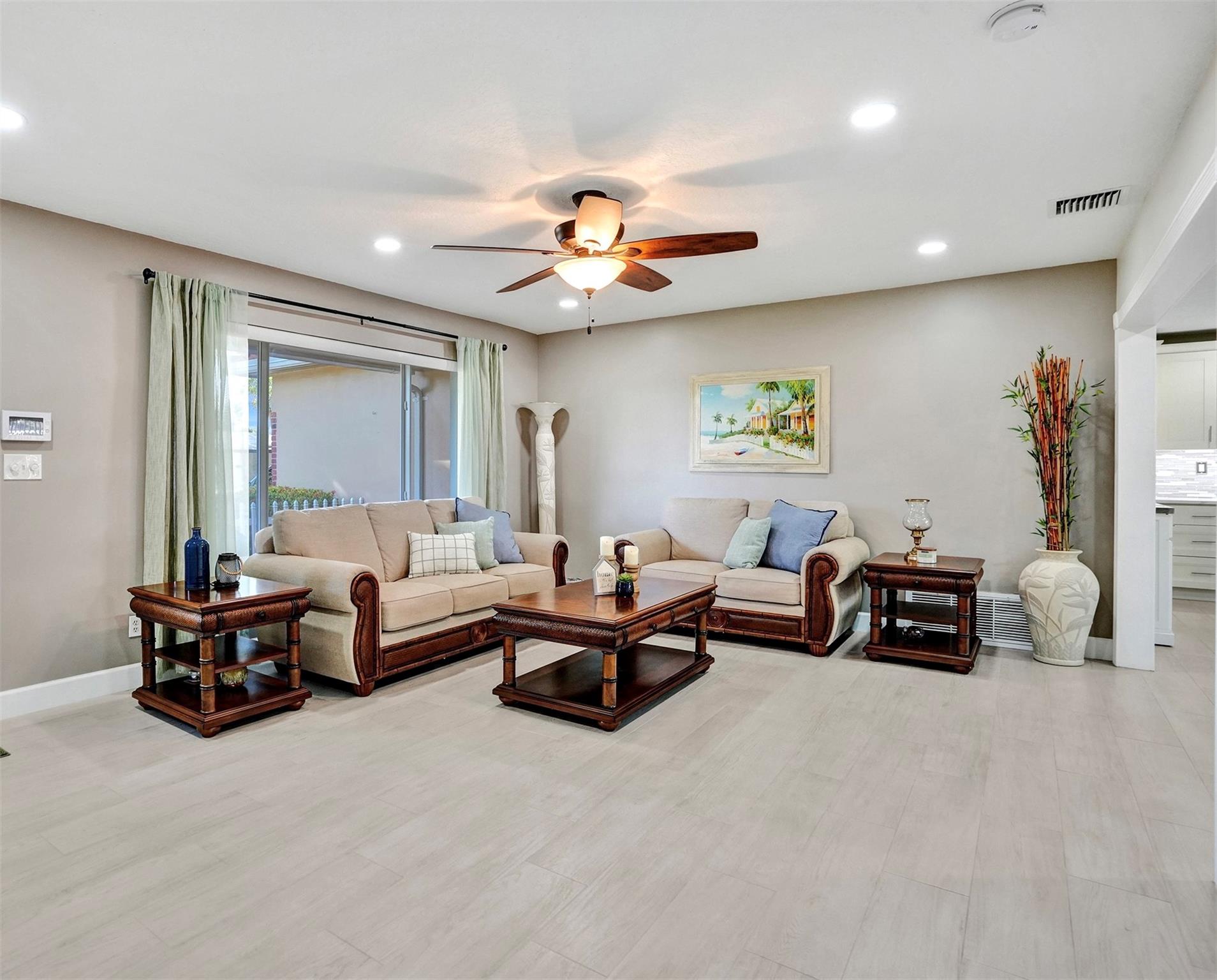 Living room with big beautiful impact glass window