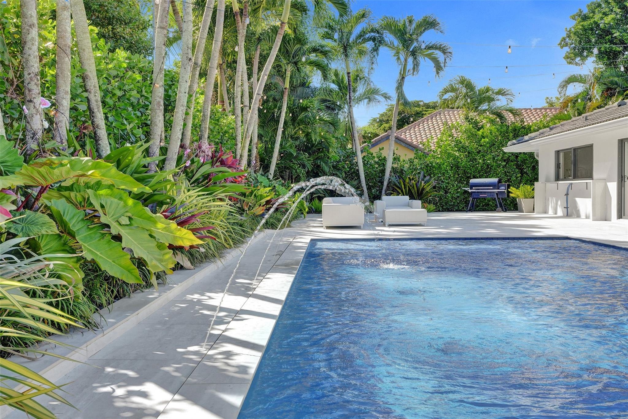 Breathtaking Private Resort Grounds Feature Absolute Privacy + New Oversized Salt Water Heated Pool + Spa + Pool Sun Lounge Shelf + Imported Italian Porcelain Pavers + Multiple Seated Lounge Areas…