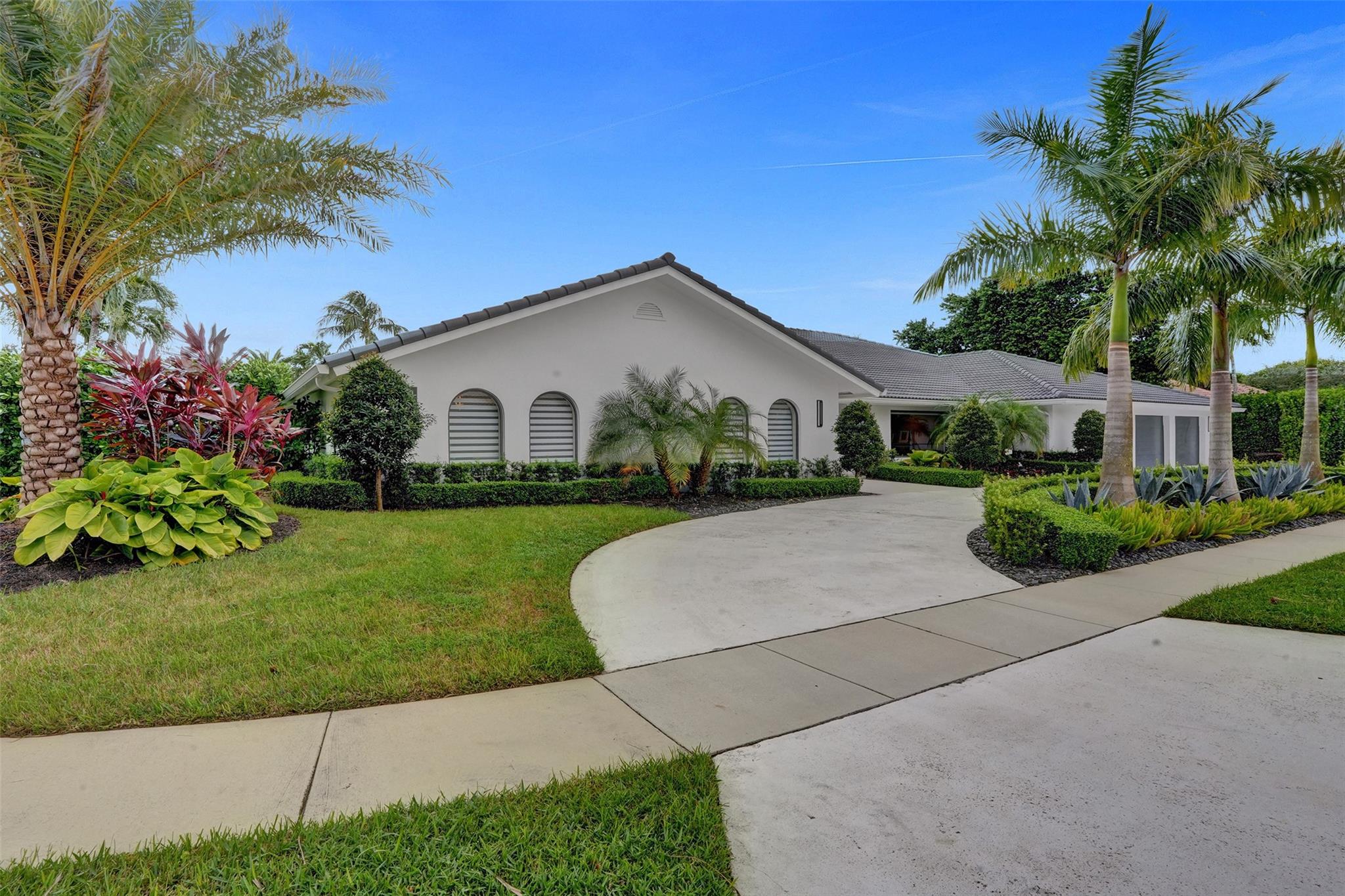 Welcome to 2674 NW 29th Drive!  This Spectacular Corner Lot Estate Features An Oversized 3 Car Garage (The Oversized Interior Garage is 950 sq ft) + Oversized Circular Driveway + All New Professional Landscaping Throughout...