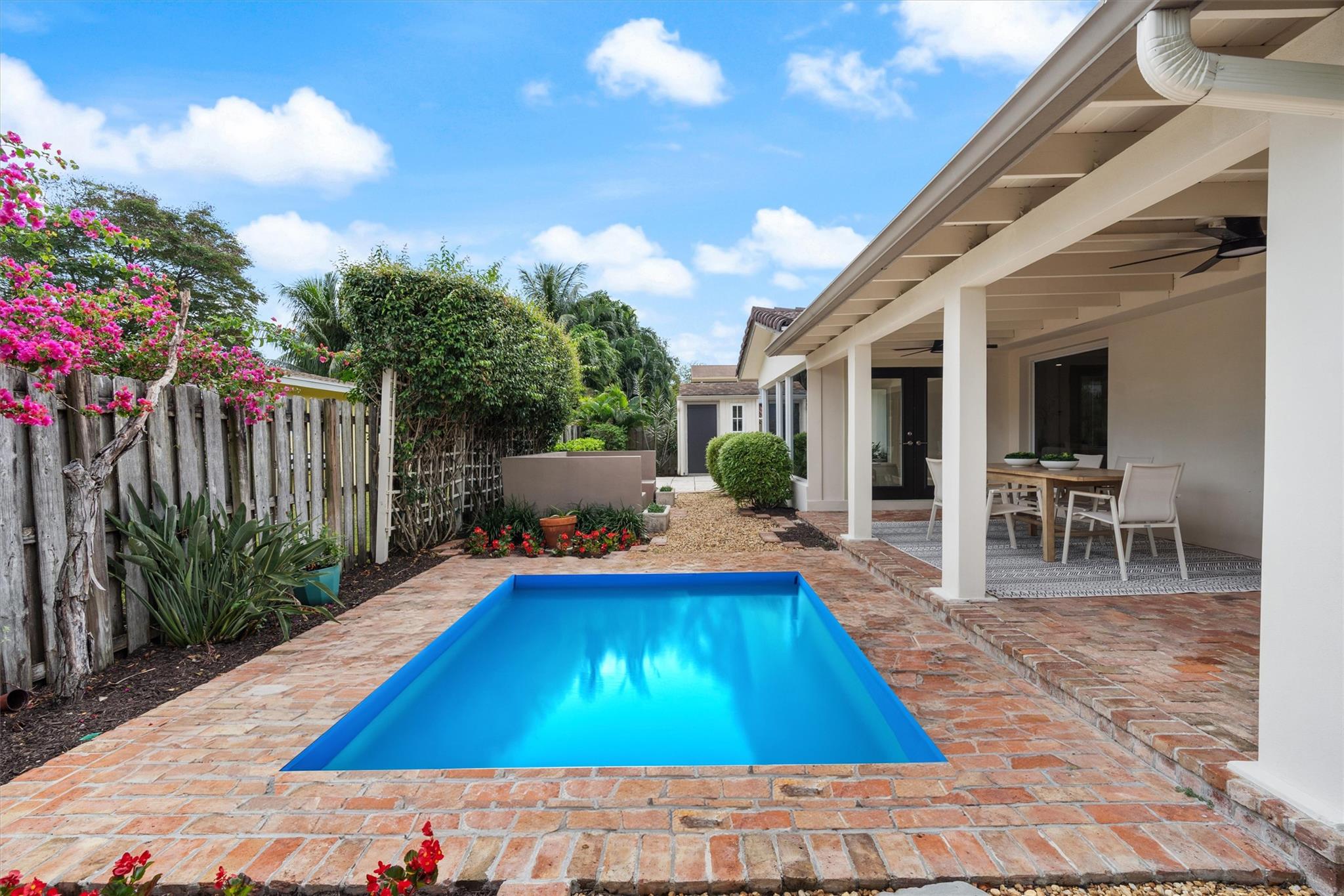 DISCLAIMER: This photo has been digitally enhanced & photo shopped to show what a pool would look like in the backyard. This is provided to assist in visualizing the backyard with a pool and may not be accurately depicted and may be changed at any time.