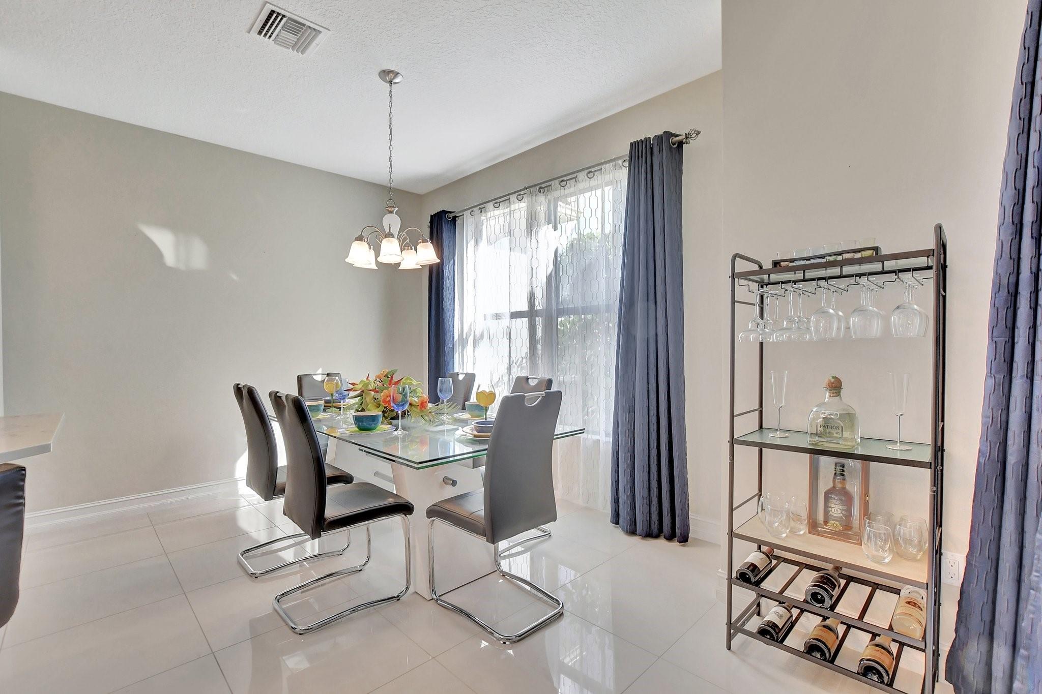 Dinner is served in your dining room overlooking the lake.