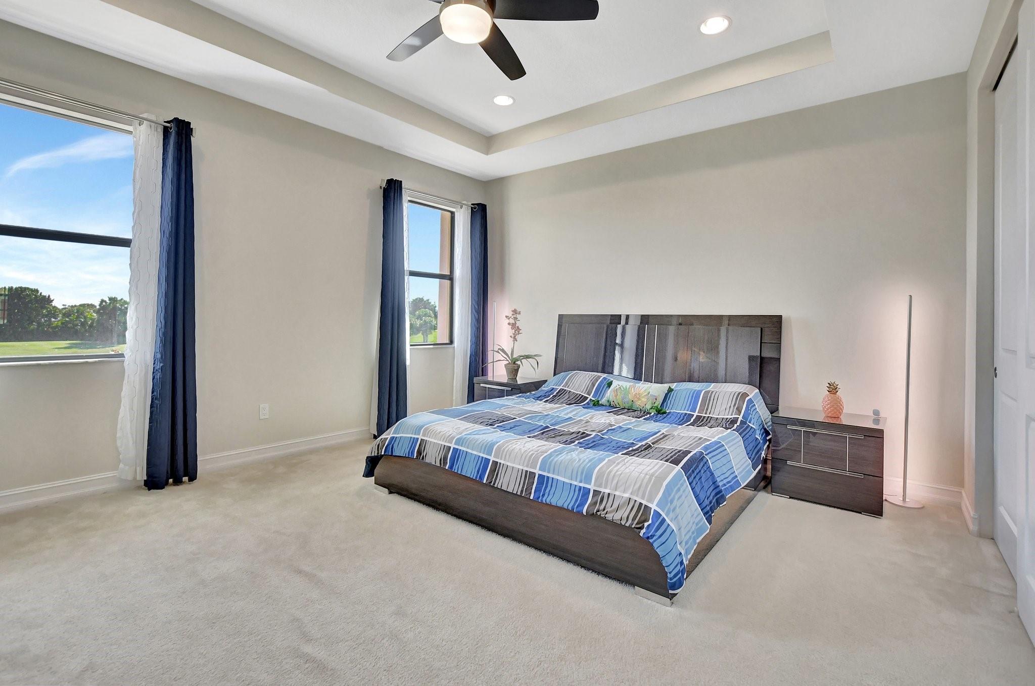 Fall in love with the 16 x 14 primary suite boasting upgraded carpet floors , a trey ceiling and sweeping views down the fairway. HUGE walk in clostet + a wall closet is perfect for fashion fans.