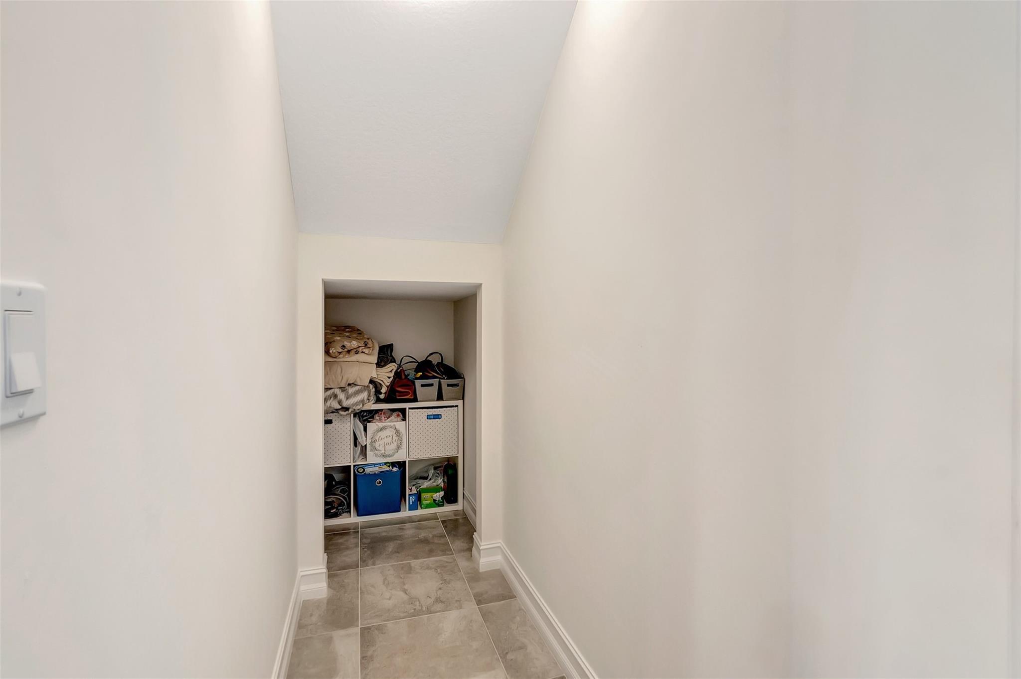 Convenient under stair storage.