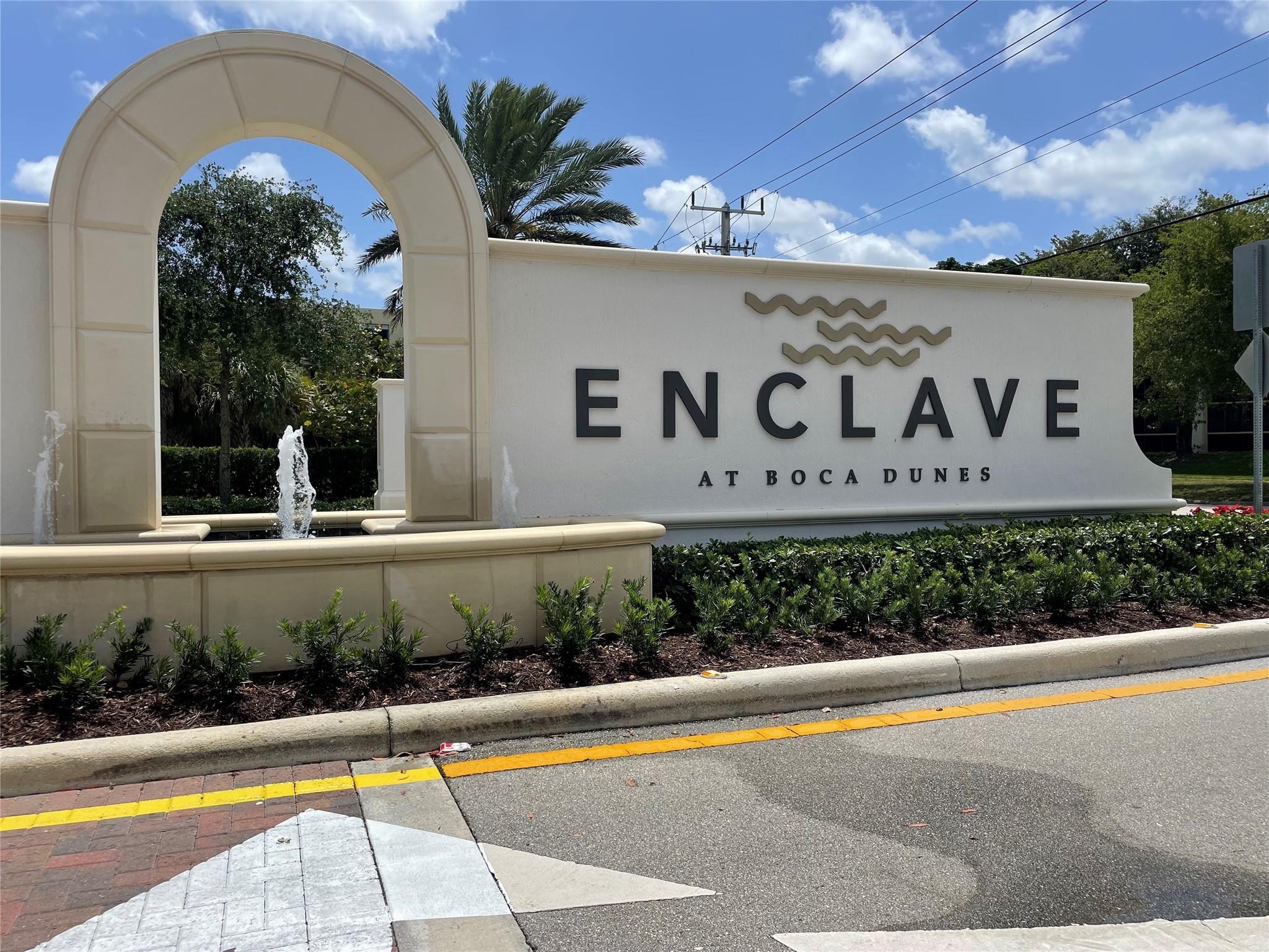 The Enclave at Boca Dunes is a gated community with LOW HOA!