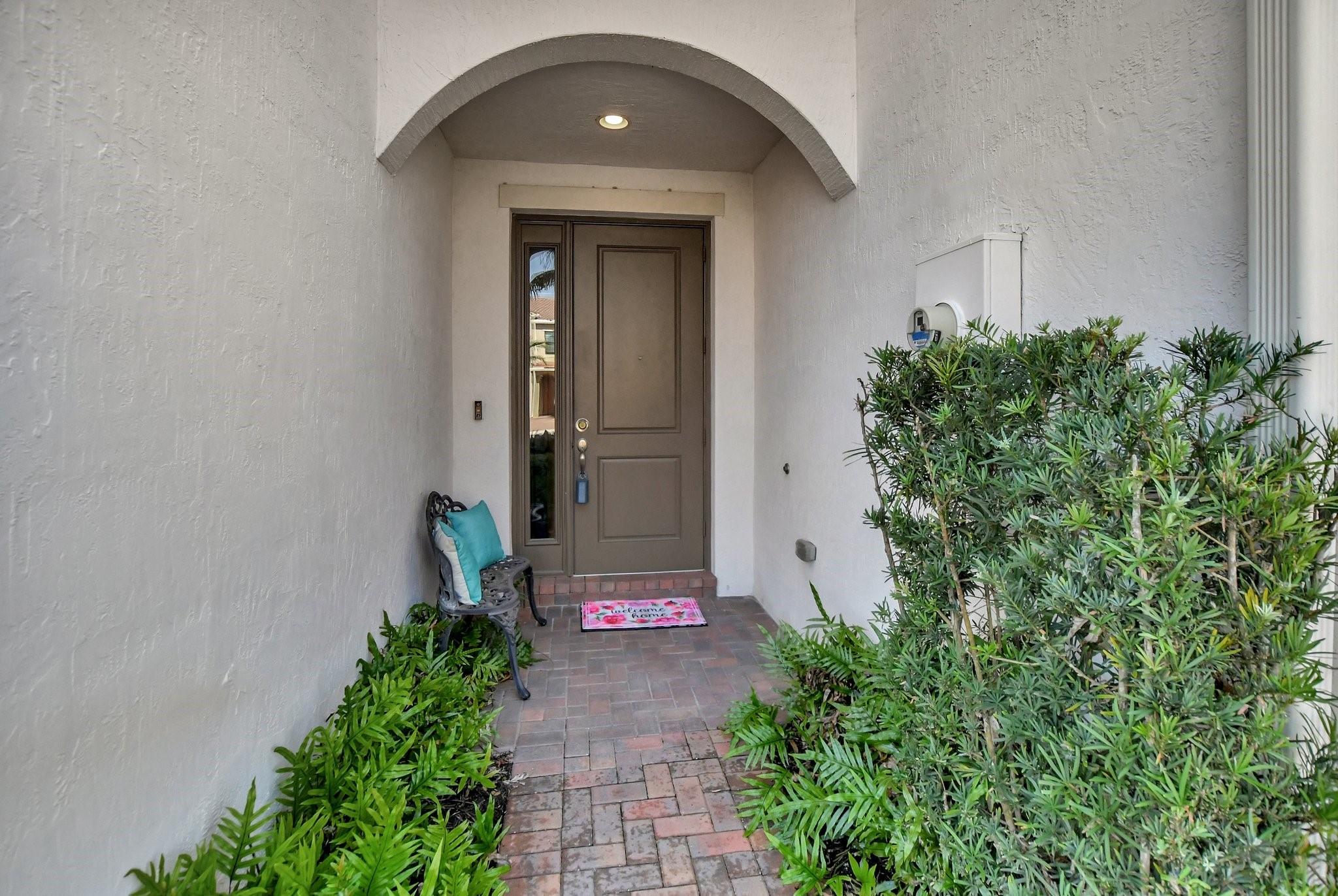 Covered paver entryway.