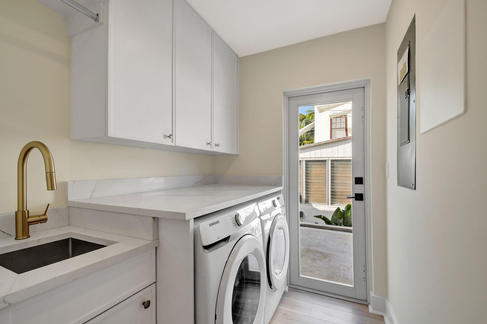 Laundry/Mechanical/Side Entrance to Driveway