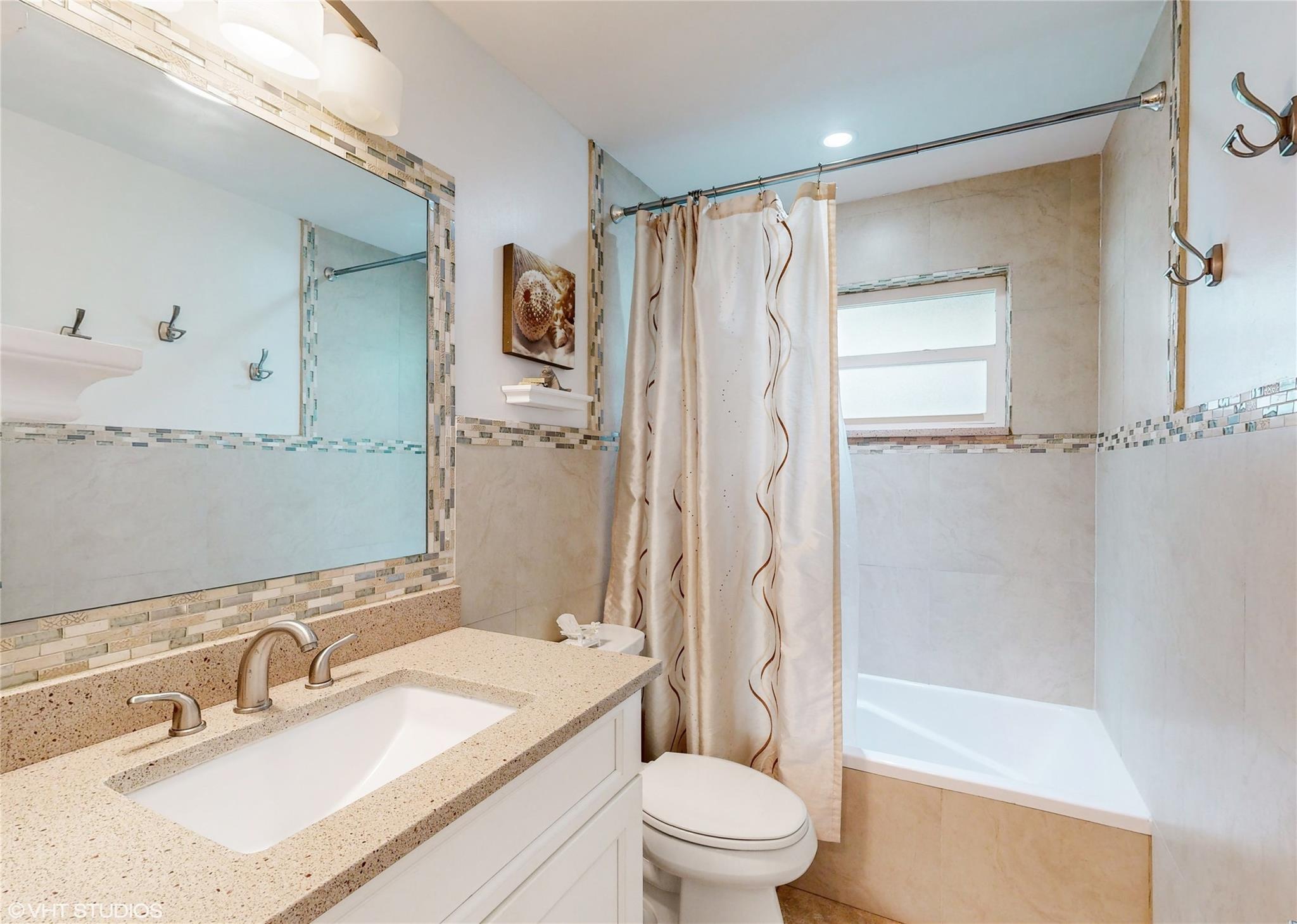 guest bathroom tub/shower combo