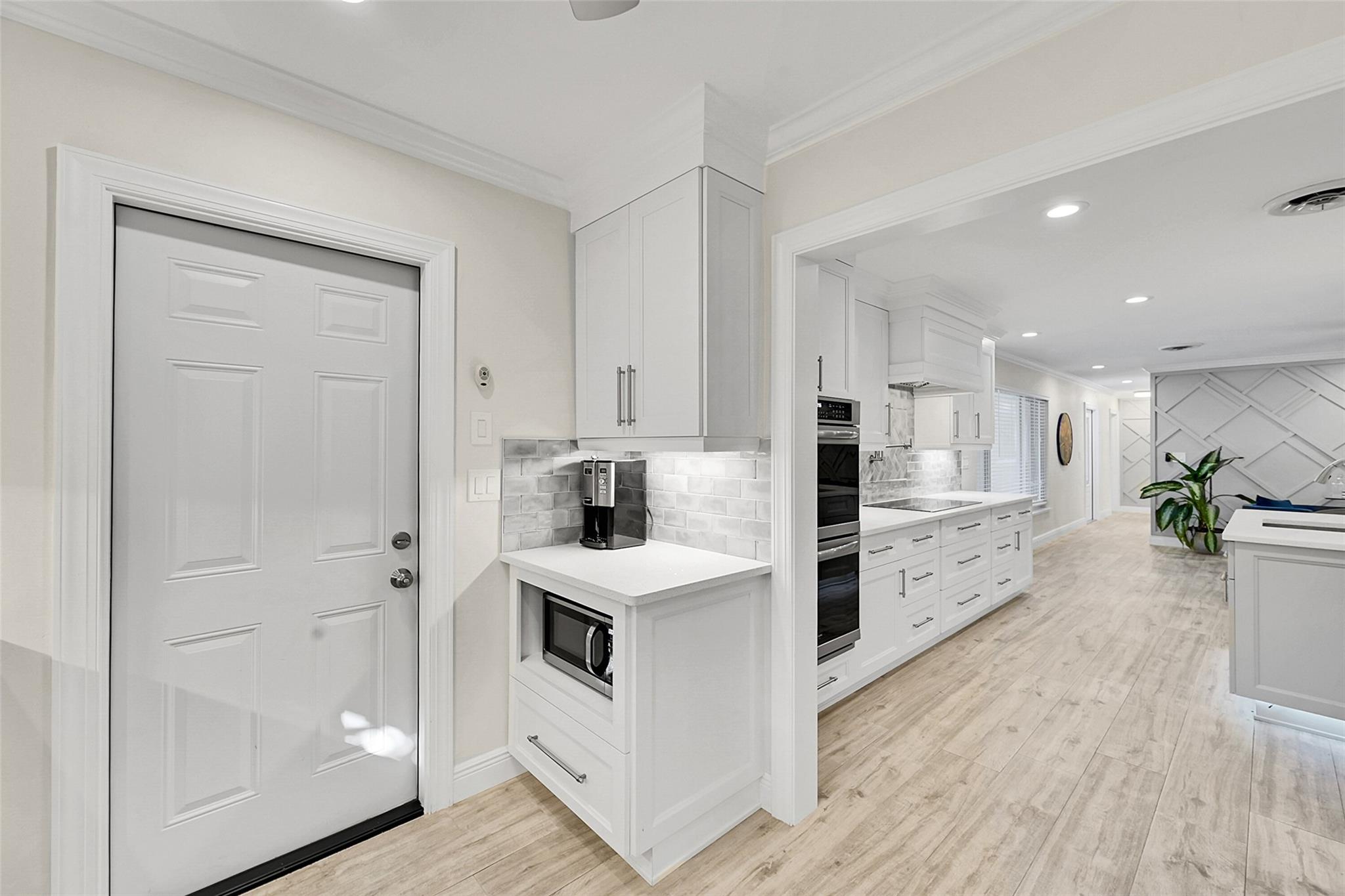 Butler pantry & entry to the garage...