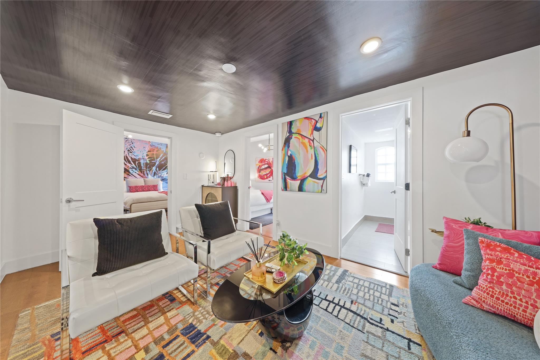 Den between 3 guest rooms