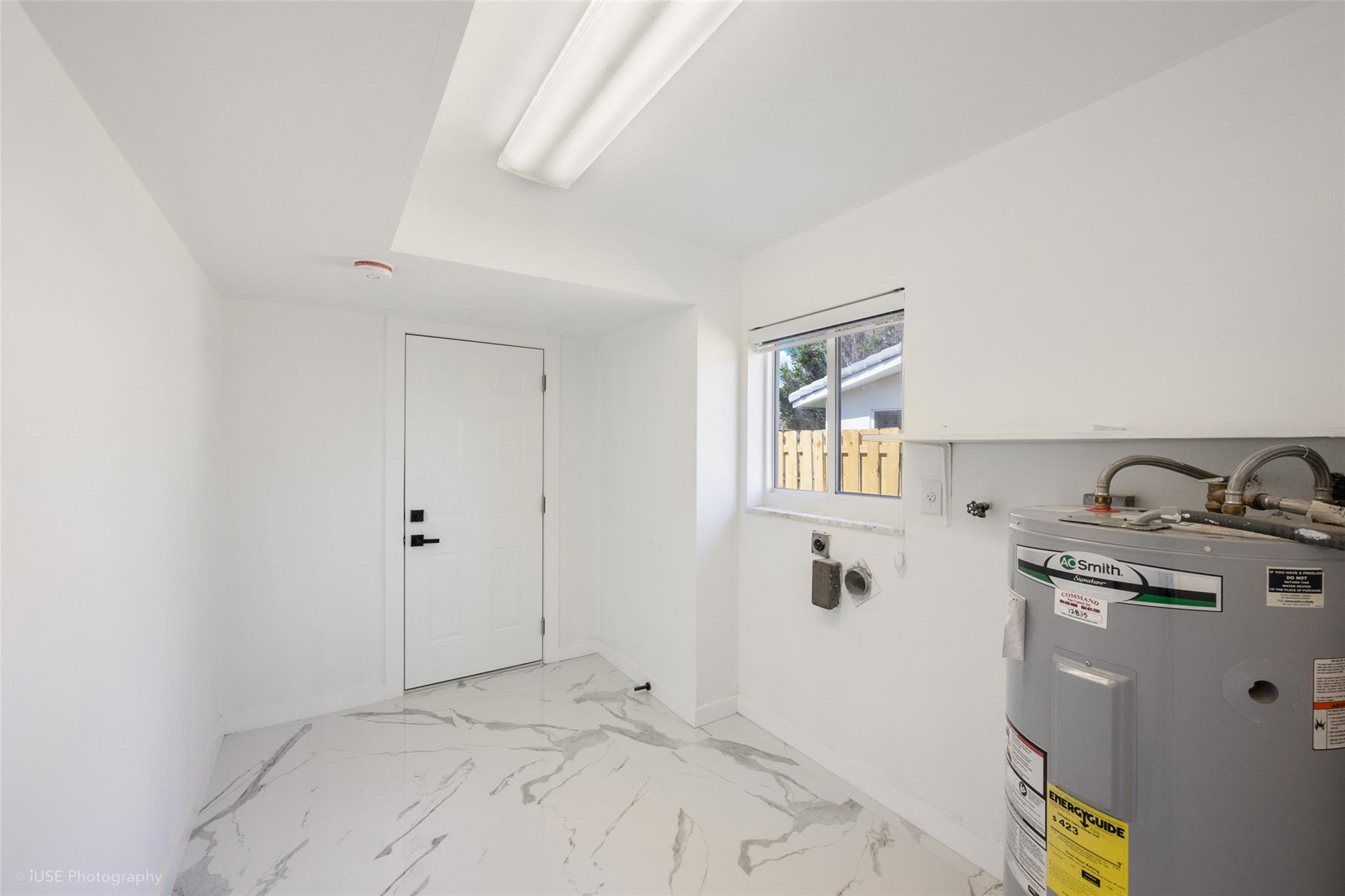 Laundry room with washer/dryer hook up