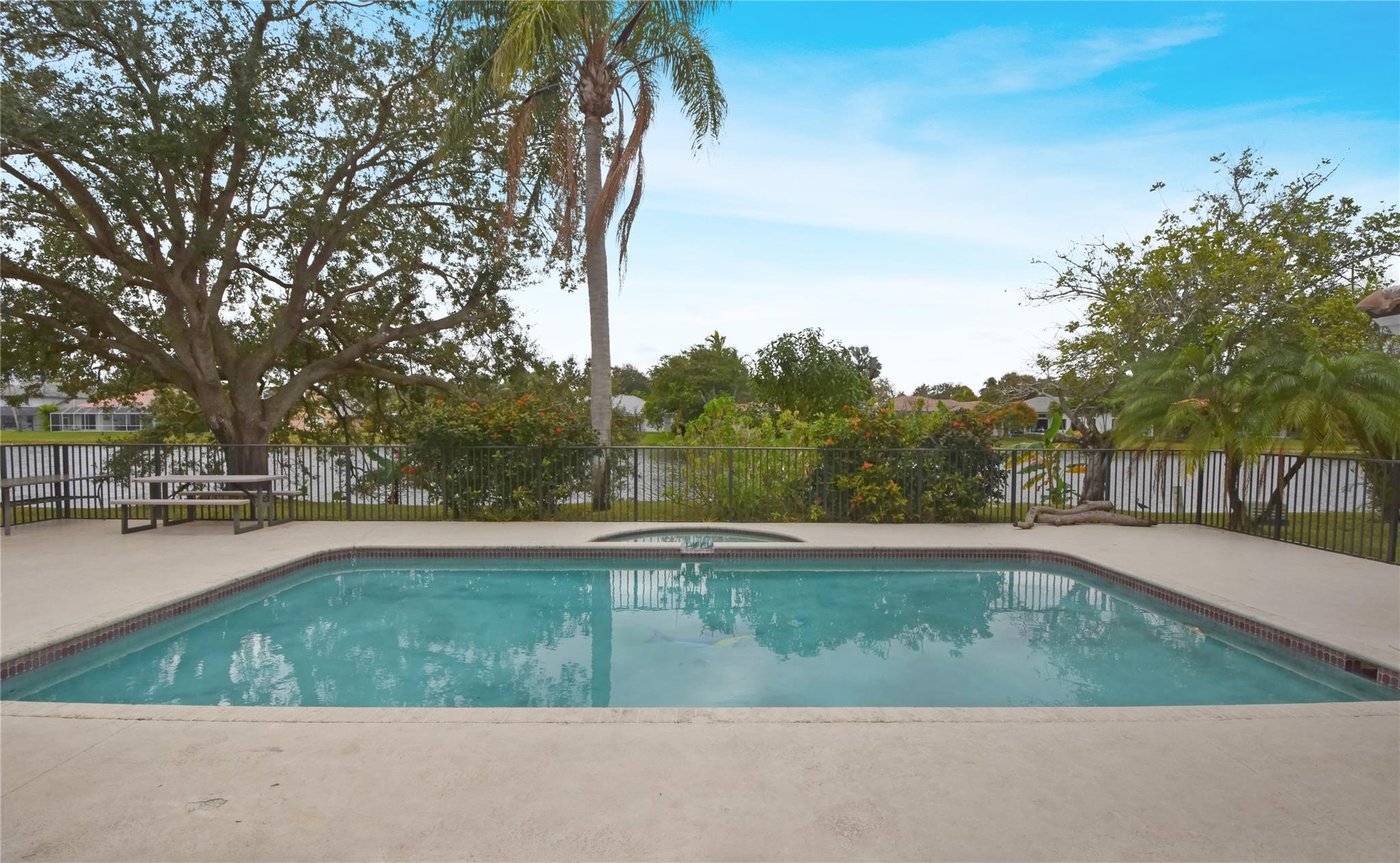 PATIO, POOL, SPA, LARGE YARD AND LAKE VIEW