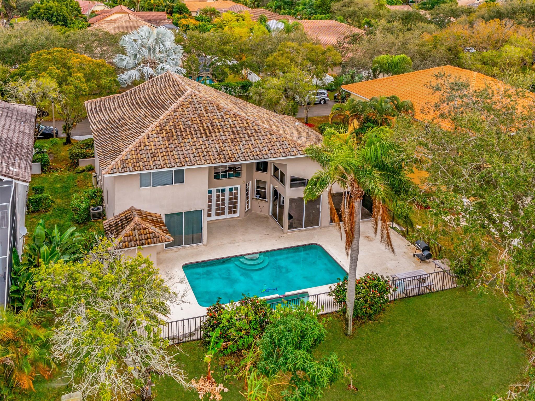 PATIO, POOL, SPA, LARGE YARD AND LAKE VIEW