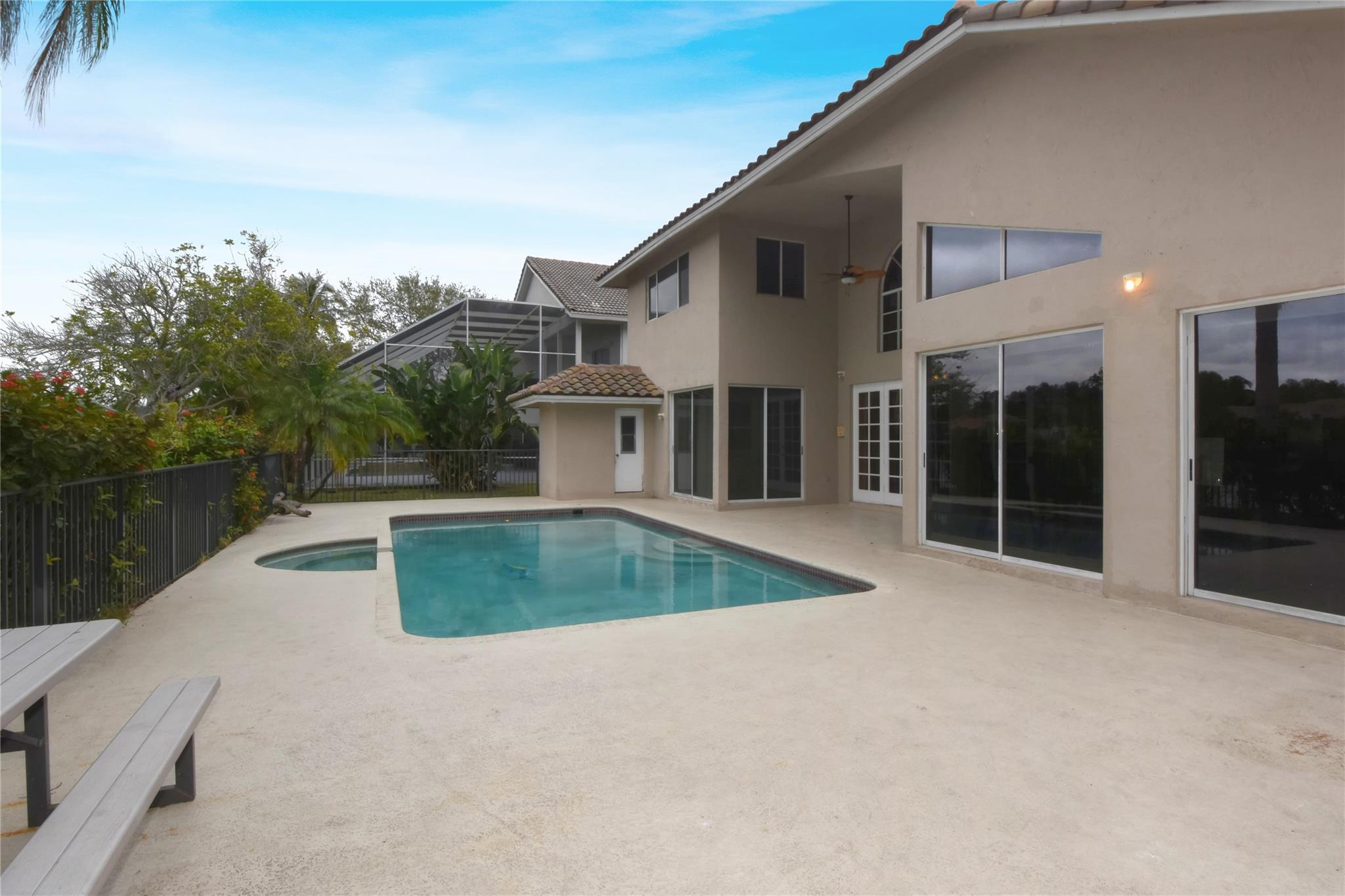 PATIO, POOL, SPA, LARGE YARD AND LAKE VIEW