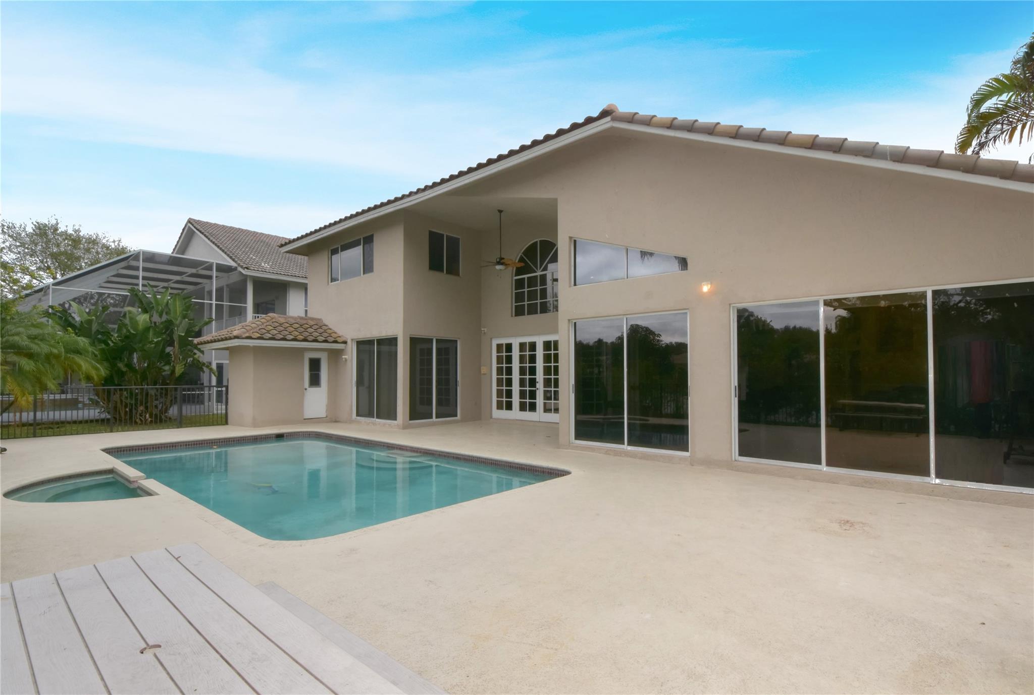 PATIO, POOL, SPA, LARGE YARD AND LAKE VIEW