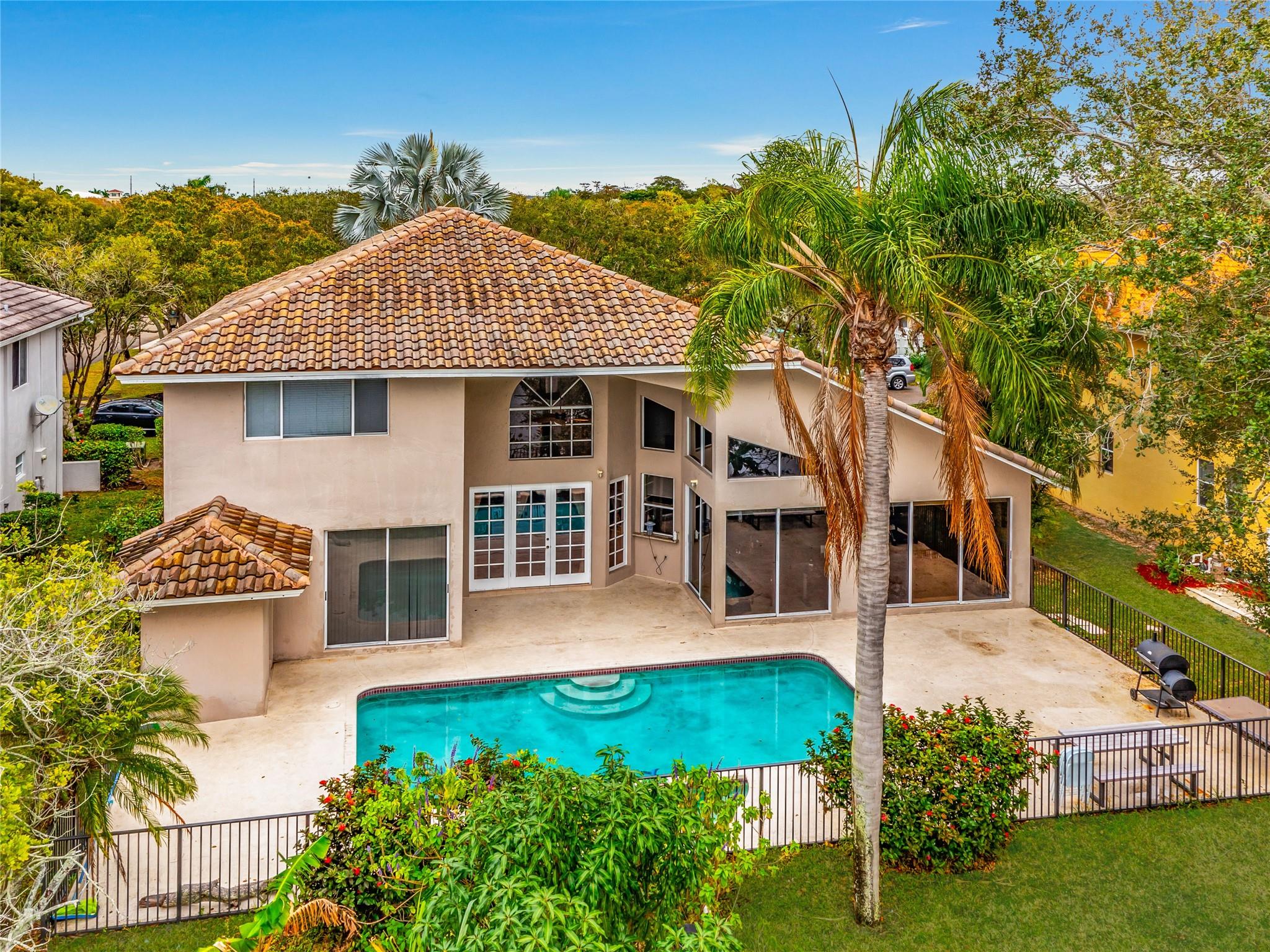 PATIO, POOL, SPA, LARGE YARD AND LAKE VIEW