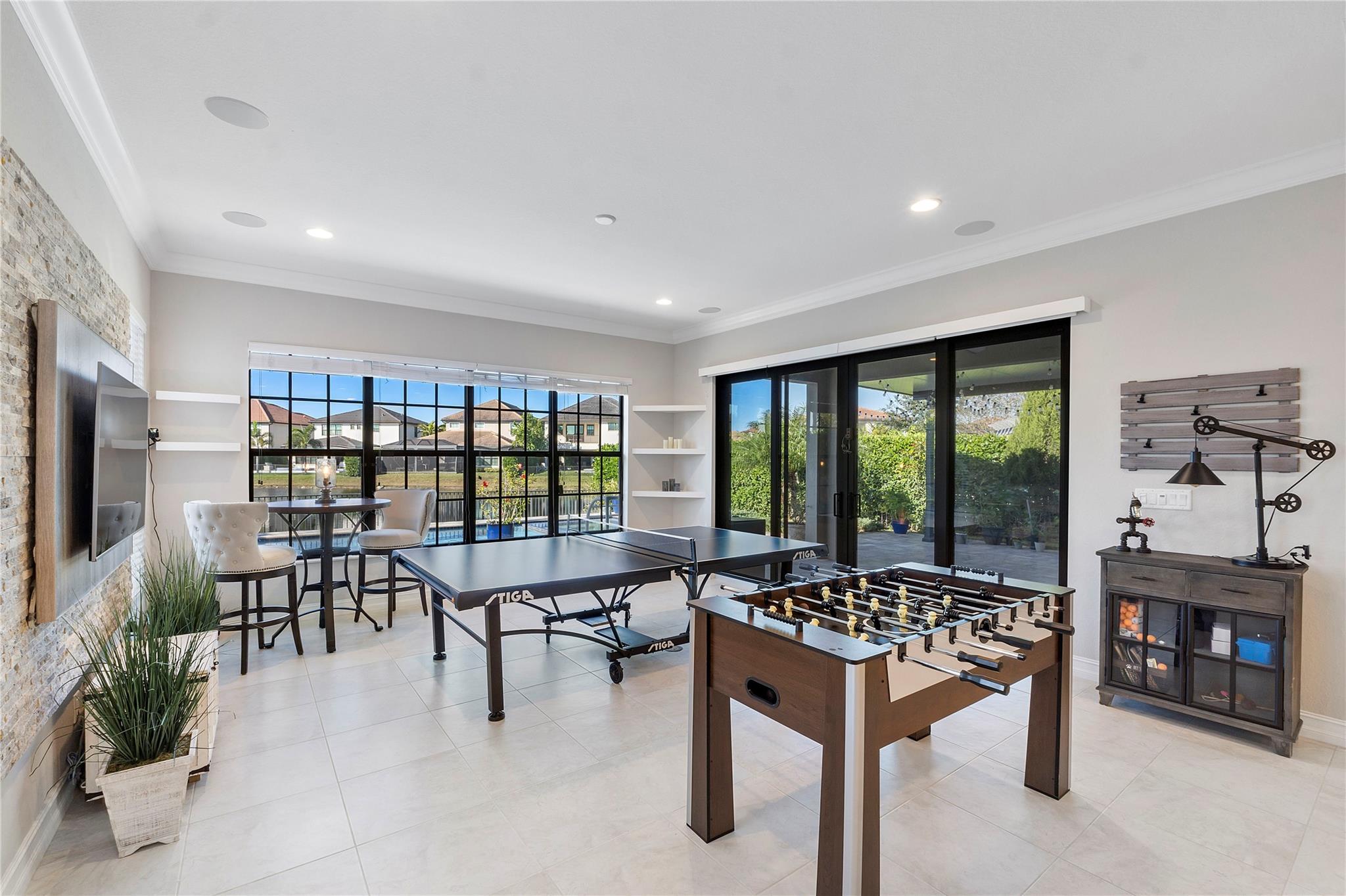 The largest open floorplan family & Living room in Parkland, Great for family time and movie watching and great for entertaining!