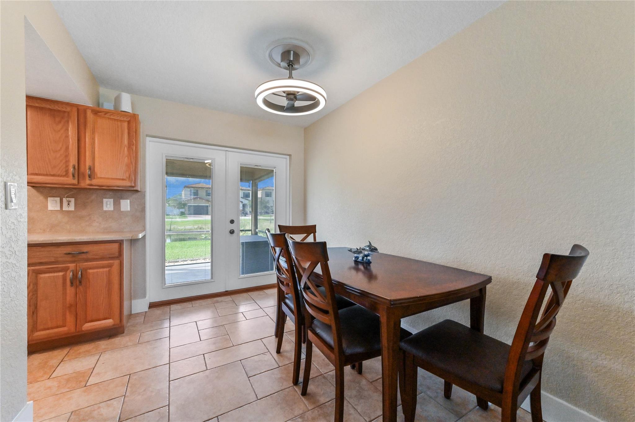 Designer light fixture/ceiling fan