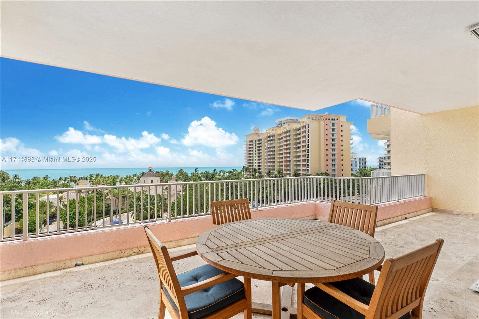 DIRECT OCEAN, BAY, SUNSET & MIAMI SKYLINE VIEWS from this rare two-level residence at The Ocean Club. Offering approx. 4,200 SF, the layout features 4 bedrooms and 5 baths, plus a spacious living room, family room, and four oversized terraces designed for effortless indoor-outdoor living. The 7th floor includes the living/dining area, kitchen, and a guest bedroom, while the 8th floor offers three additional bedrooms, three baths, and a second family room—ideal for privacy and flexible use. Marble floors, a full-service lobby, guard-gated security, deeded beach access, four assigned covered parking spaces #746, #560, #558, #647 and two storage bins complete the offering.