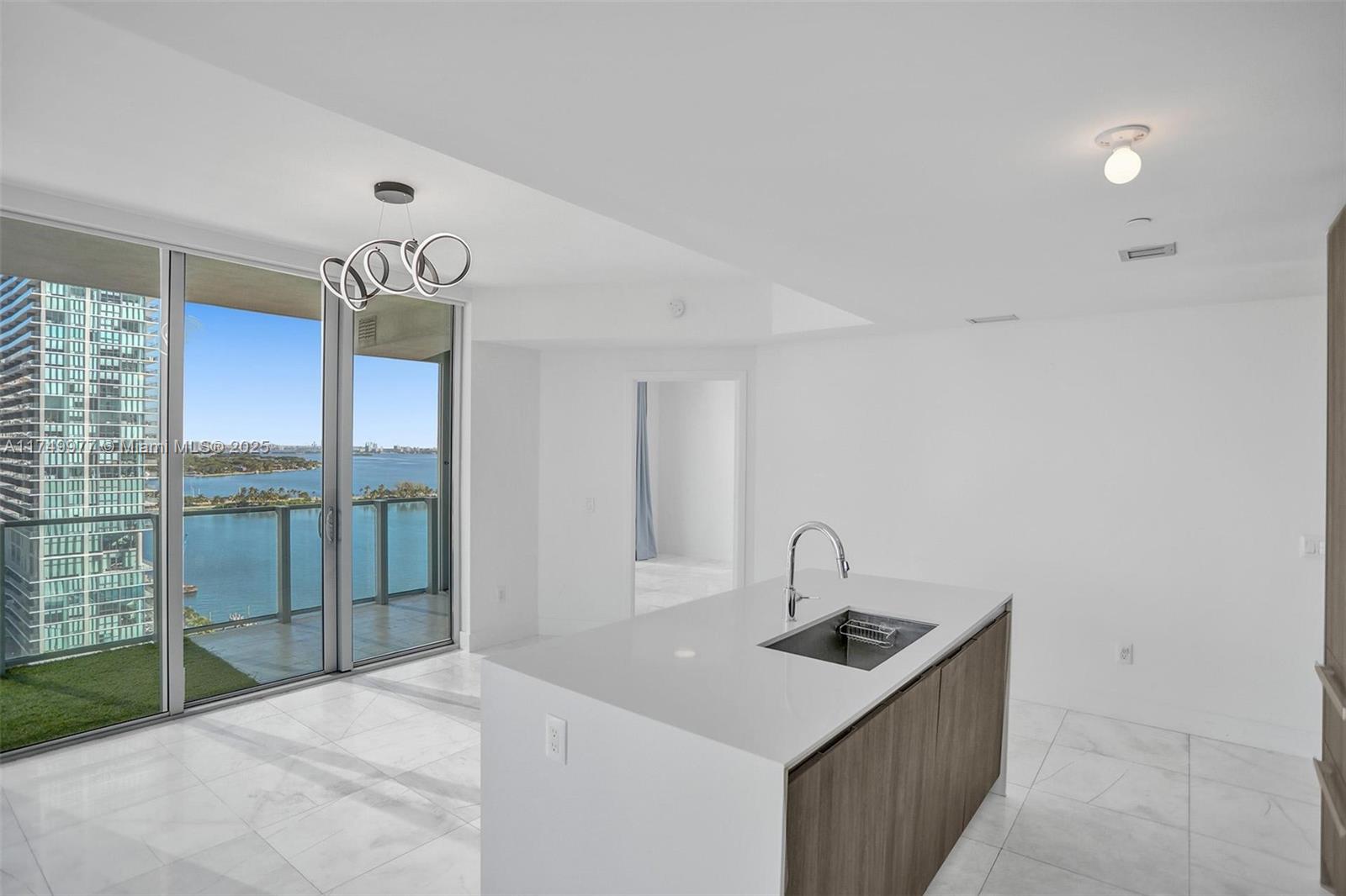 Fabulous 2 bedroom 2.5 bath unit at Biscayne Beach condo.  Floor to ceiling windows, private elevator foyer, blackout shades , built in closets, direct water views with balcony access from both bedroom and living room.  Luxury building with 24/7 concierge, spa and fitness center, Hampton style beach club, volleyball court, tennis court, cabanasand multiple pools. The unit is currently rented for $5000.