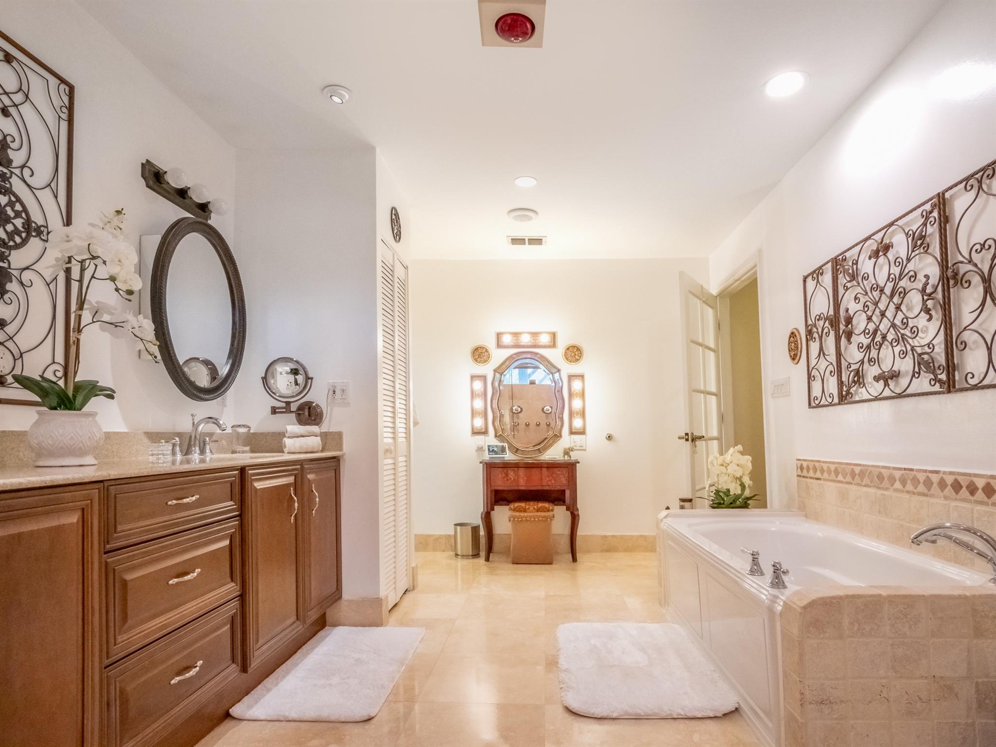 Primary w/Dual Kohler Sinks, Kohler Hot tub & Built-in Makeup Area