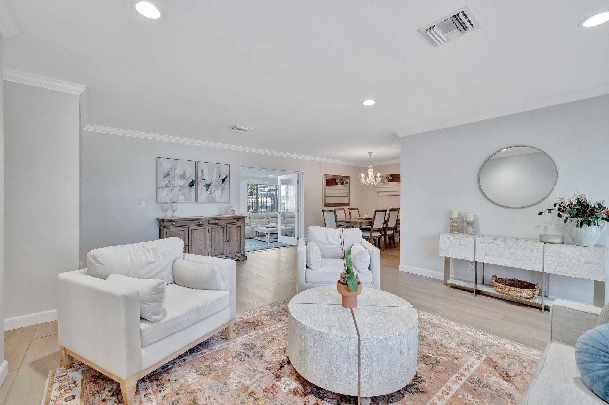 Designed for effortless living, the open floor plan seamlessly connects the living and dining areas.