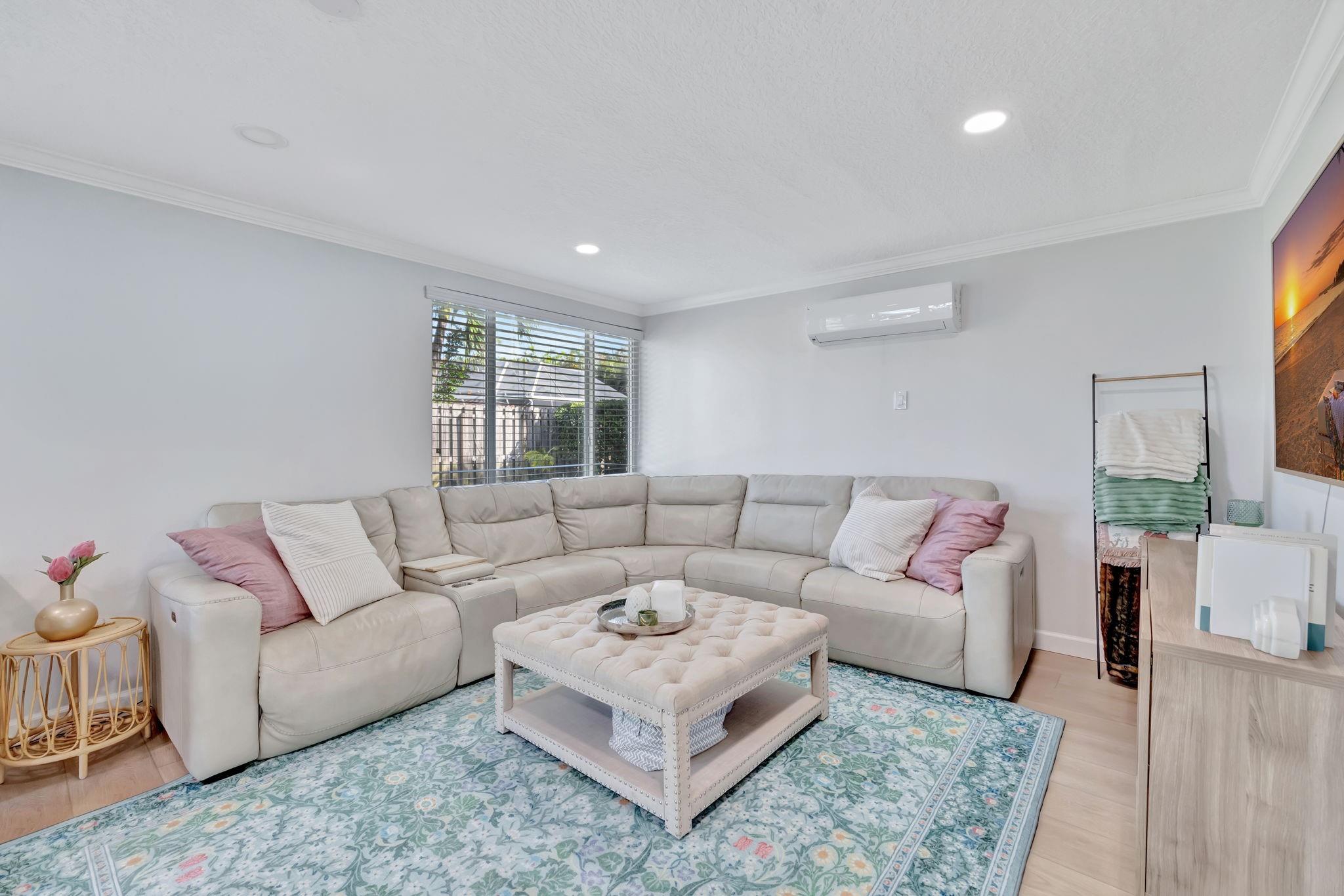 Just beyond the main living area, you’ll find a large family room.