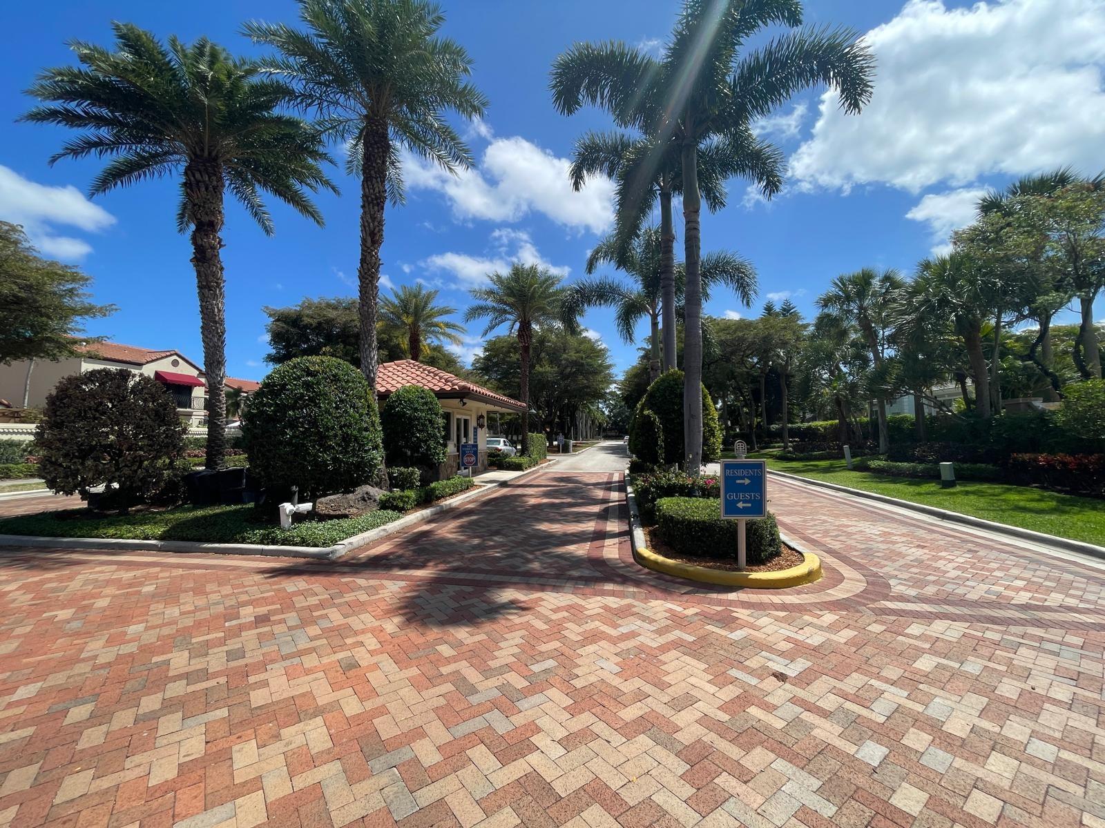 24 hr Manned Gatehouse, with security guard driving neighborhood