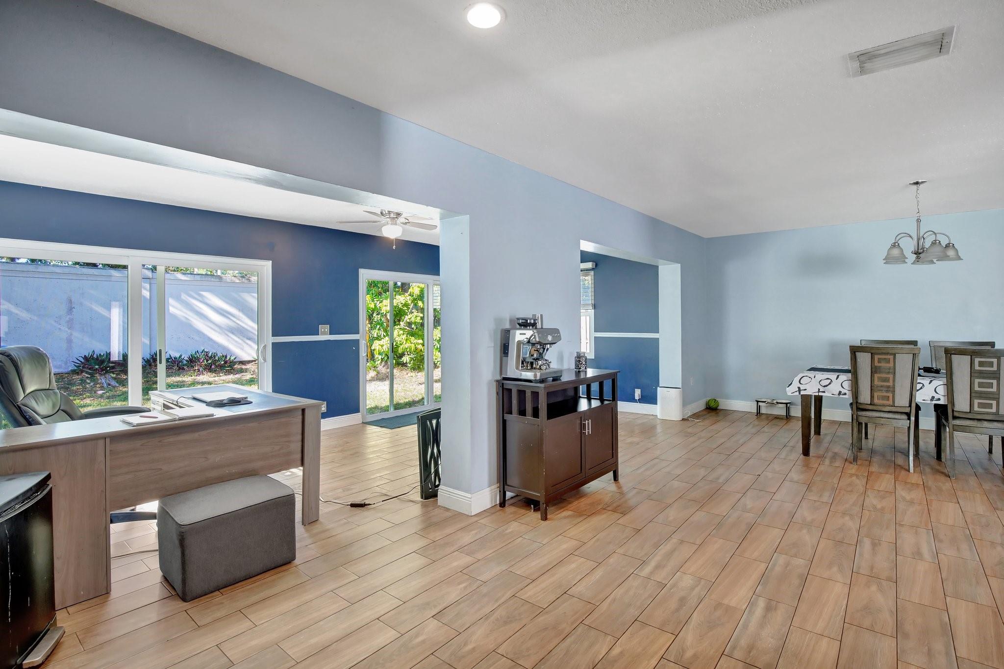 Kitchen area overlooking the dining room and the bonus room in the back of the house.