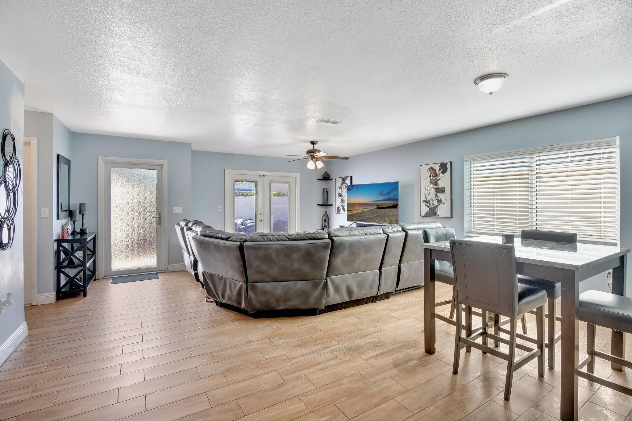Family room area looking towards the front door and the French doors leading to the front courtyard