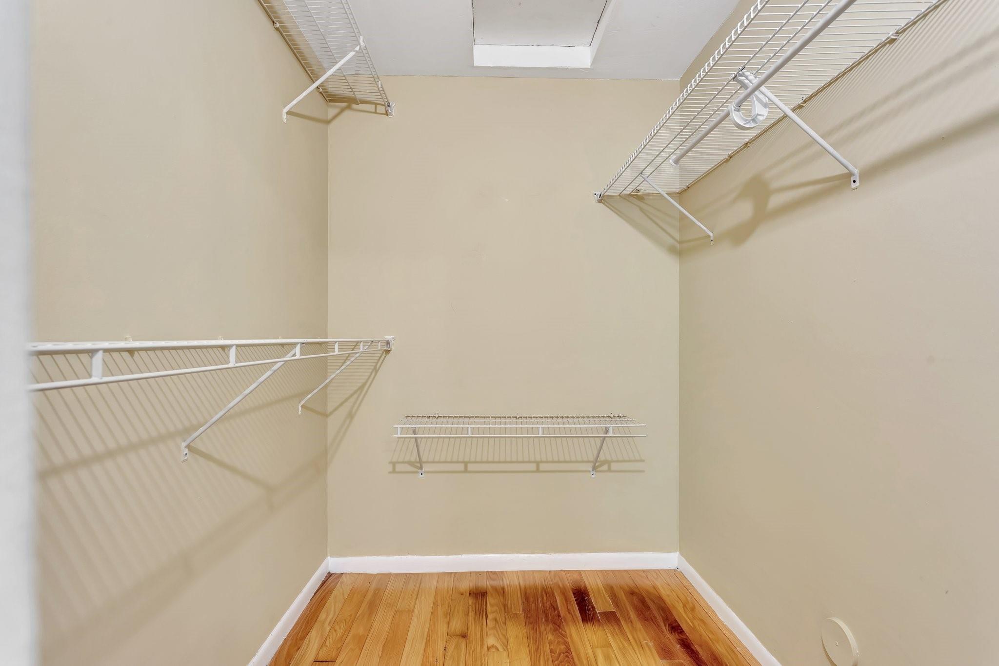 Walk-in closet for primary bedroom