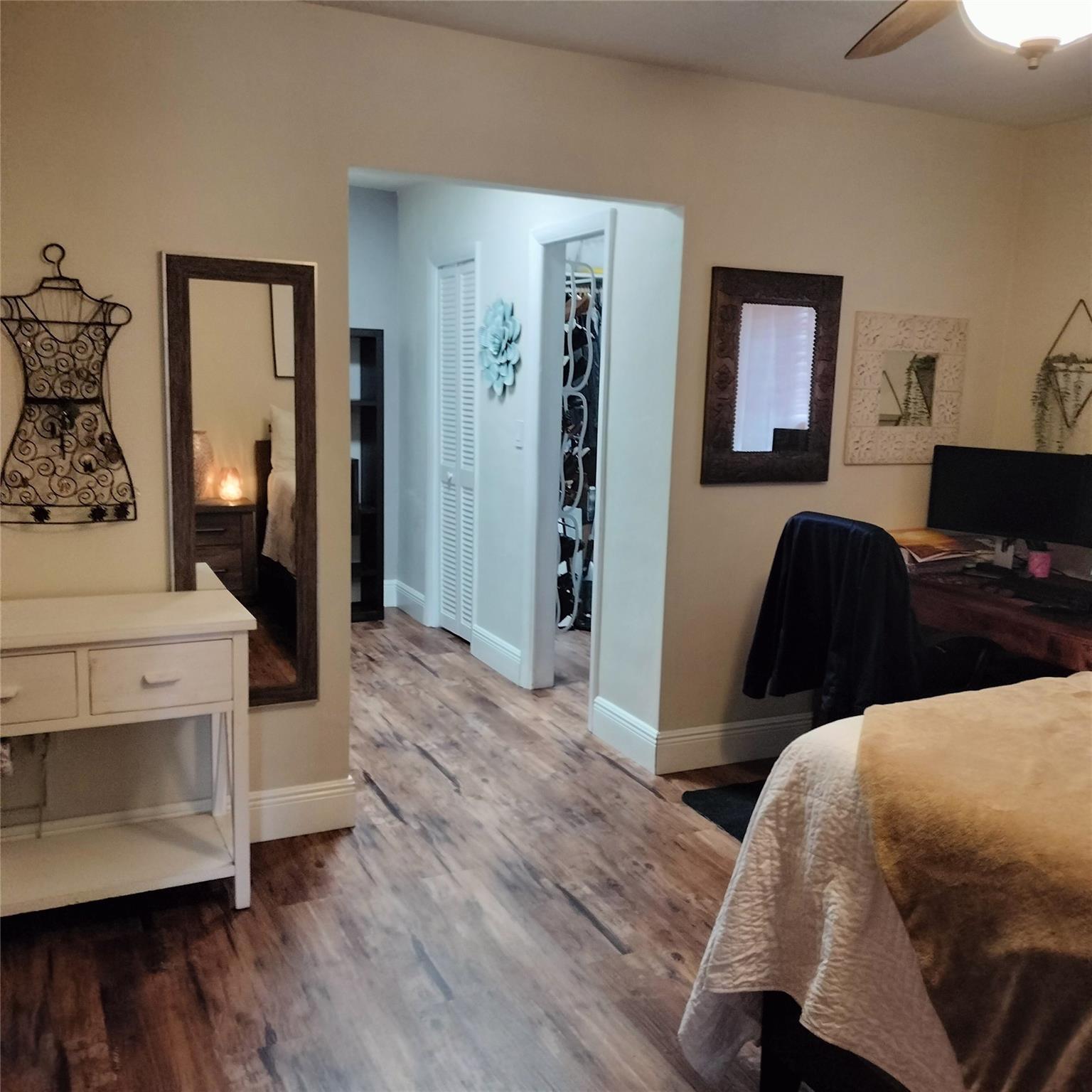 Walk-in closet with 2 door entry.