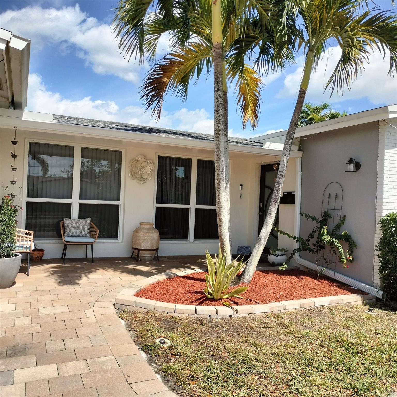 Pavered walkway and front patio.