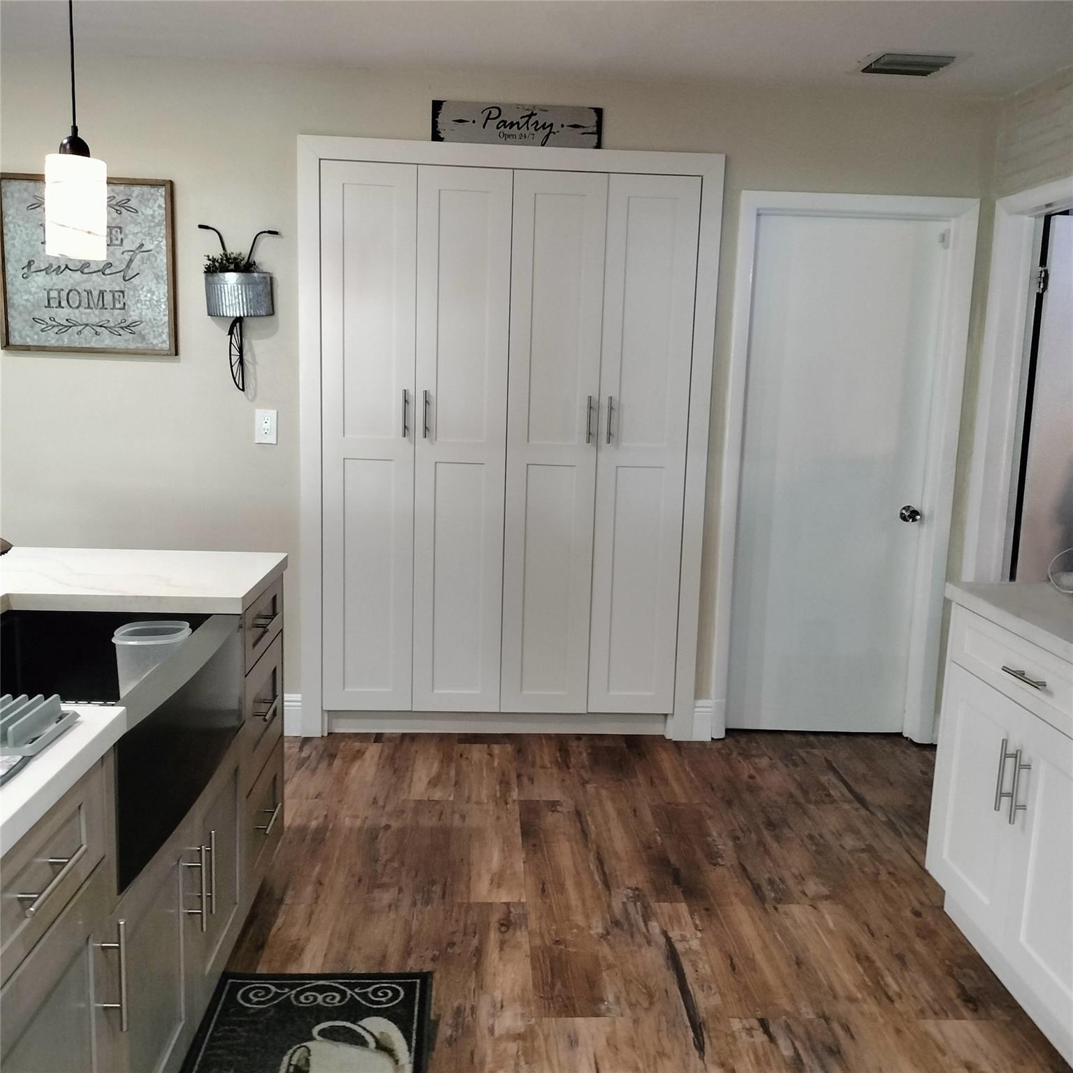 Big Pantry in Kitchen. Door to garage for easy access.